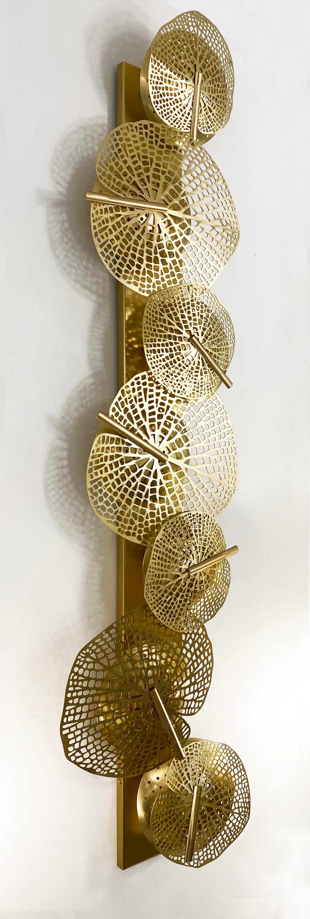 We give you the outside to bring into your interiors! The brass leaves of different sizes on this Art Deco Design sculpture wall light introduce nature and it is in itself a unique Work of Art, entirely handcrafted, engraved and laser-cut.