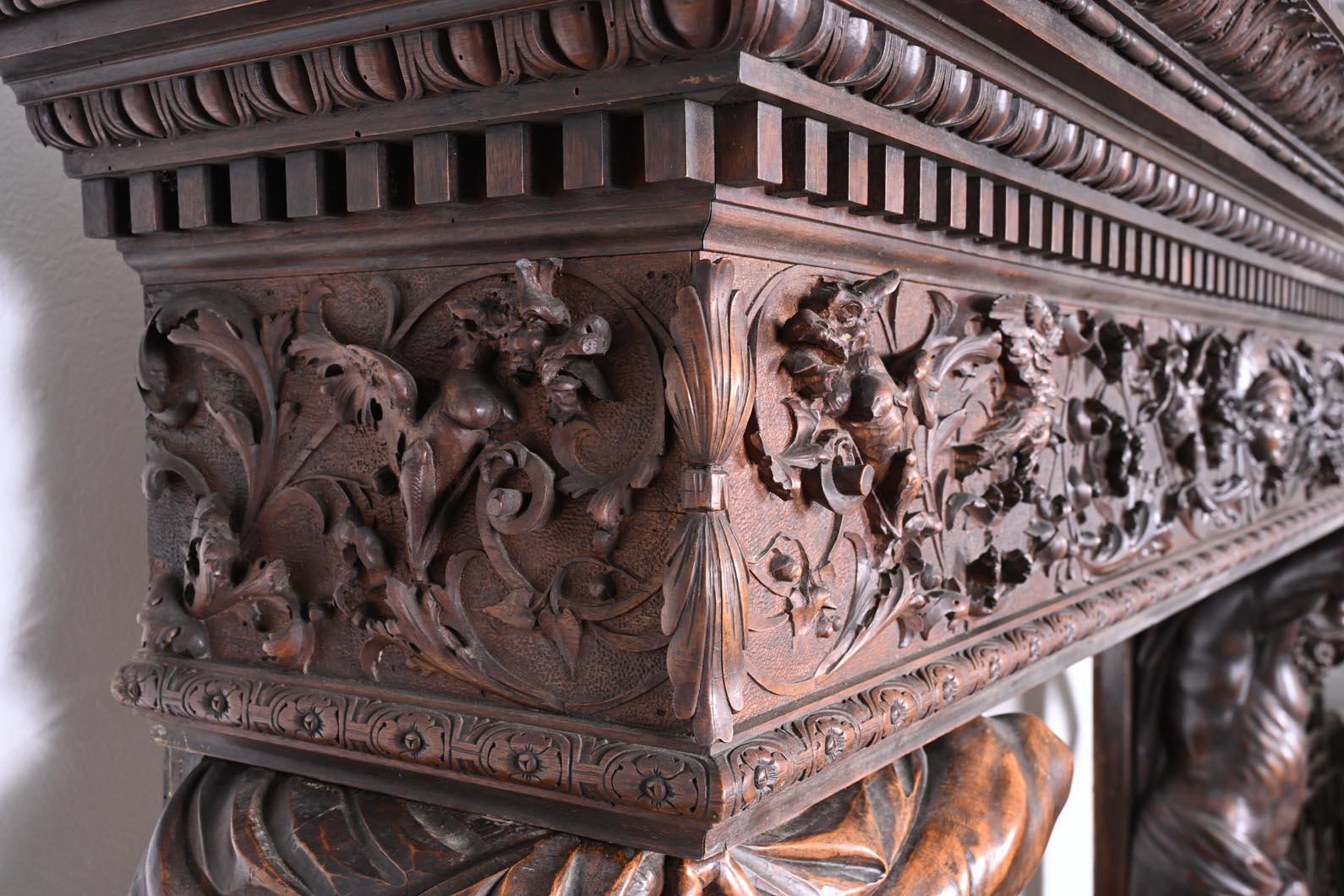 Walnut Monumental Italian carved walnut fireplace, Neo-Renaissance style, circa 1880 For Sale