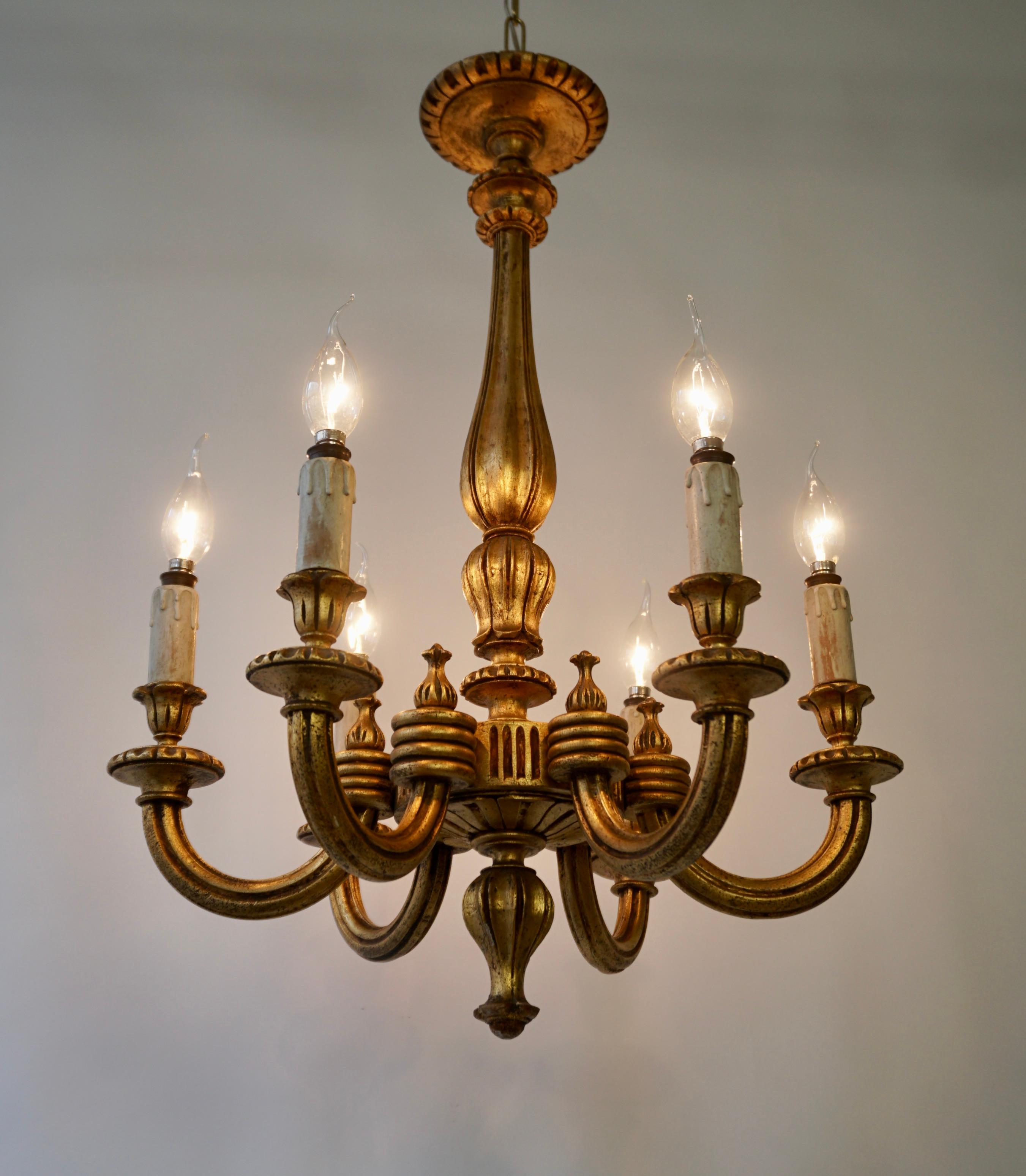 Monumental Italian giltwood chandelier. This stunning magnificent scale Italian gilt wood six light Baroque style chandelier from Tuscany has fabulous patina.
Measures: 28