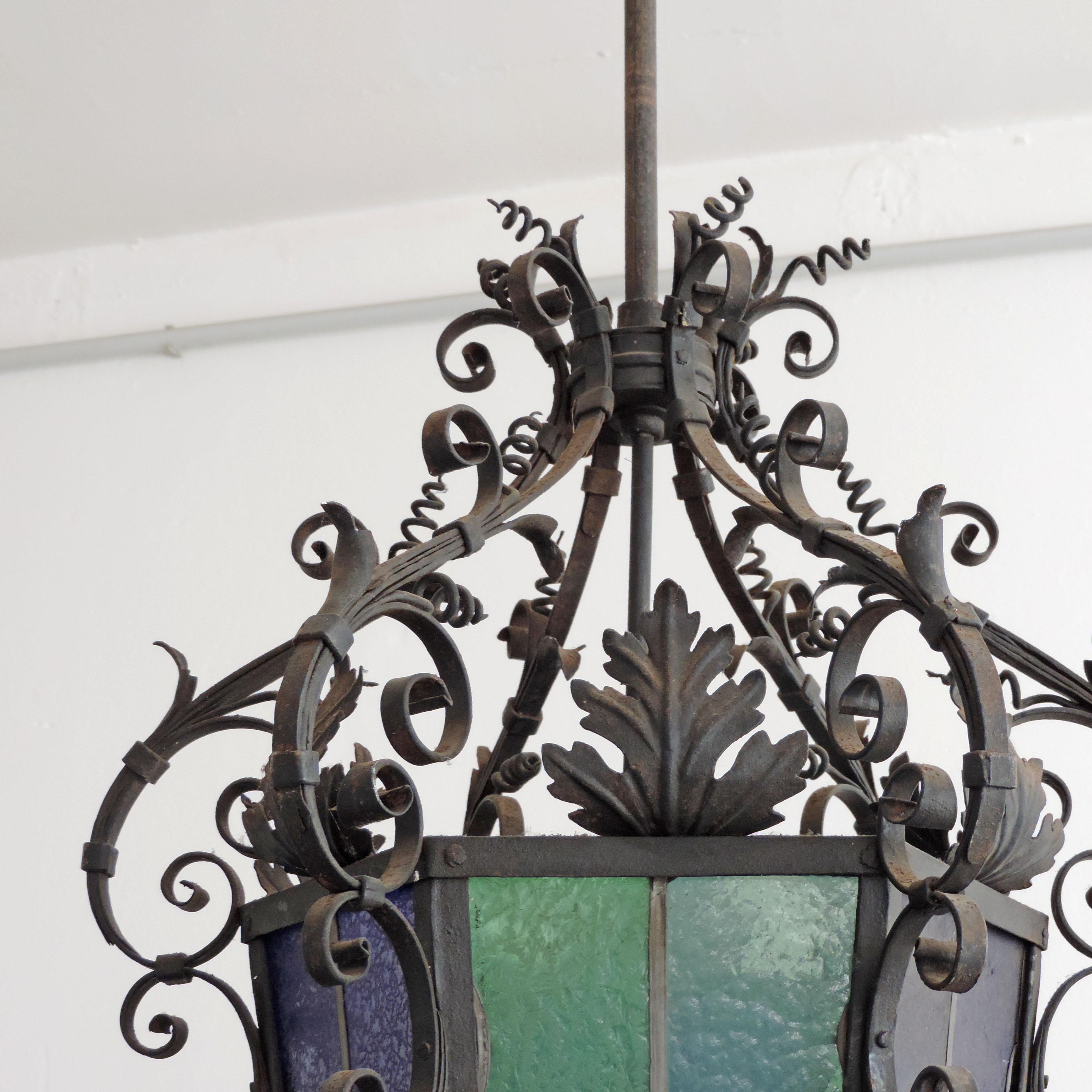 Monumental Italian Lantern in Wrought Iron and Stained Glass For Sale 1