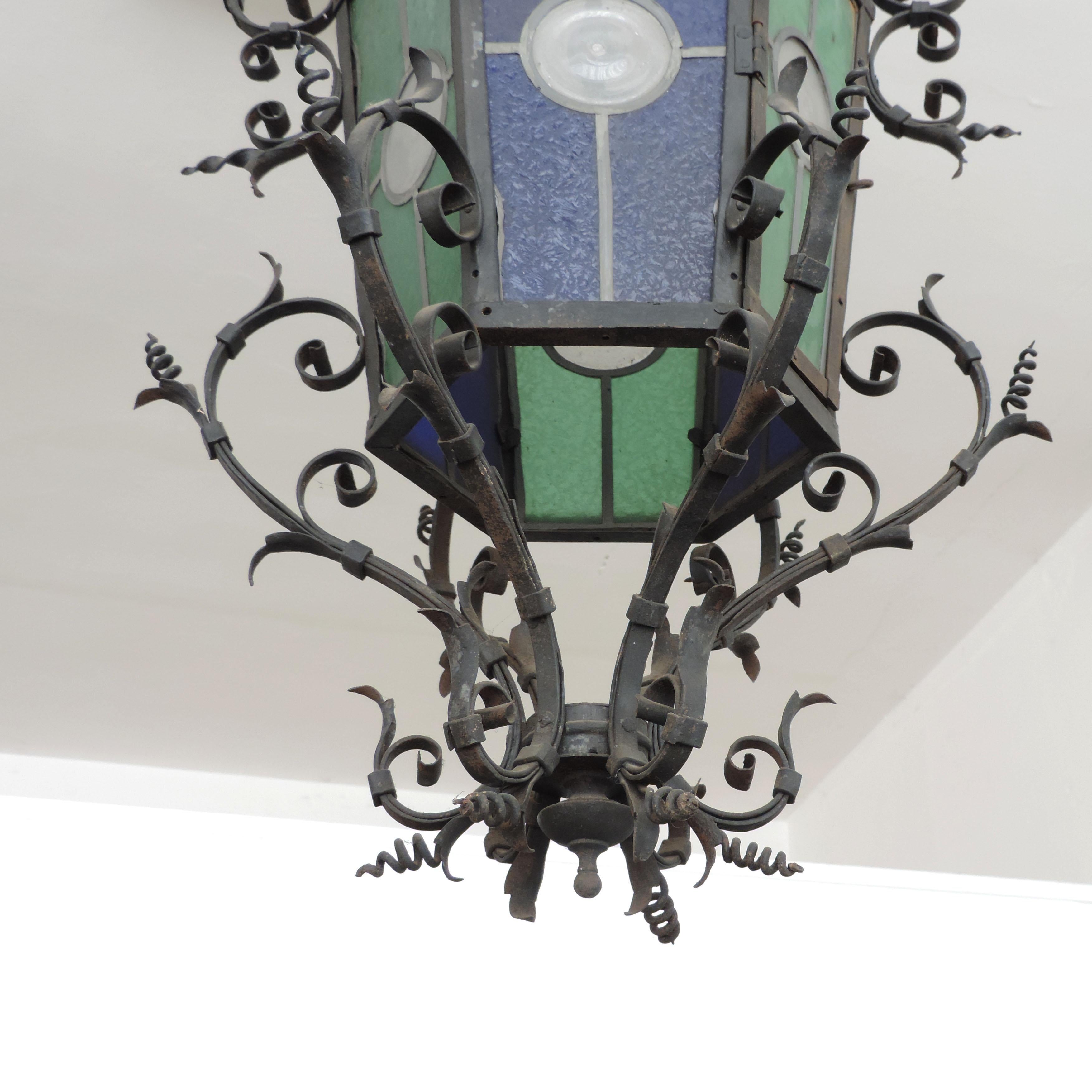 Monumental Italian Lantern in Wrought Iron and Stained Glass For Sale 4