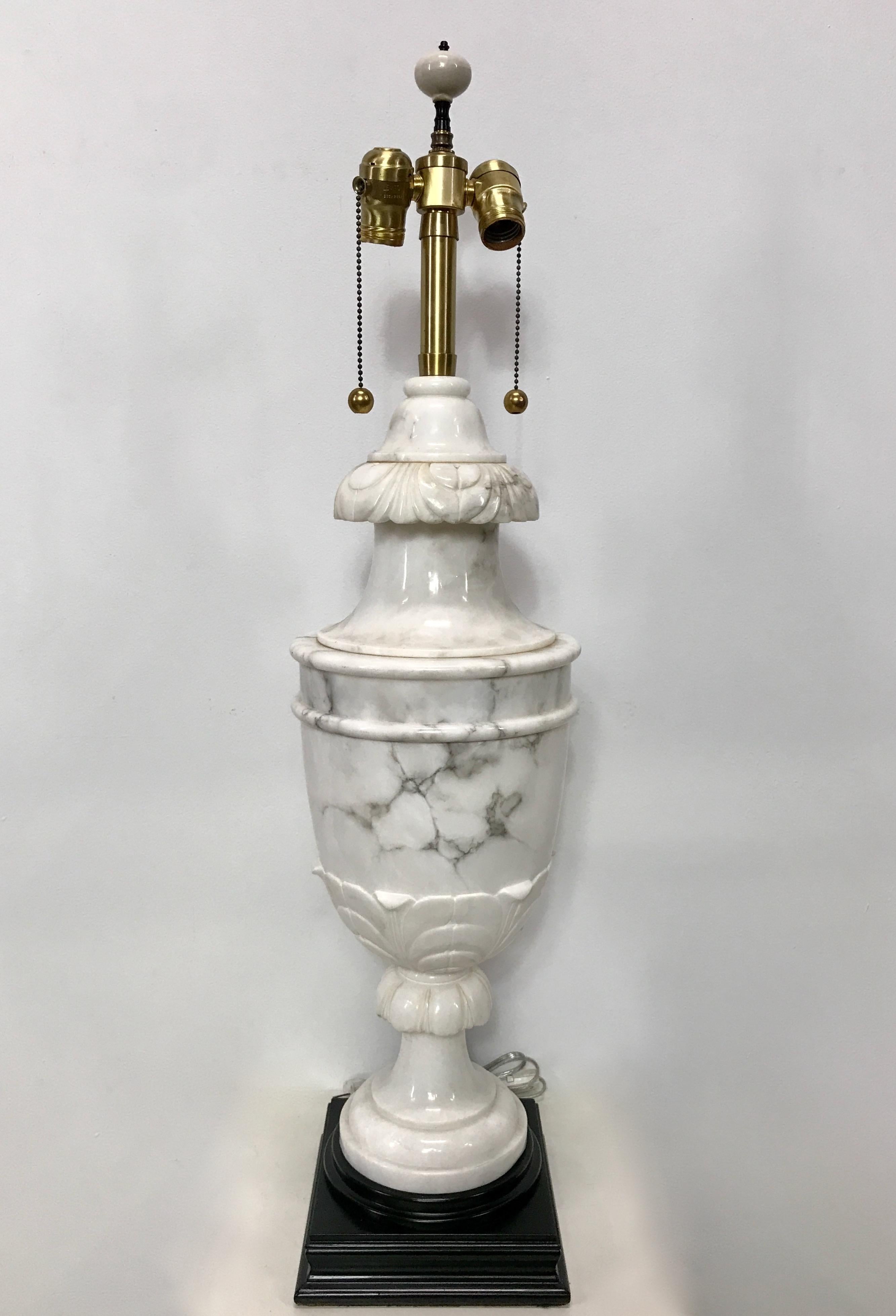 Impressive large scale Classical Style marble table lamp.
Newly re-wired and the wood base refreshed.
In excellent condition.
Italy. circa 1960.
Height of urn not including the base and hardware is 24 inches high.