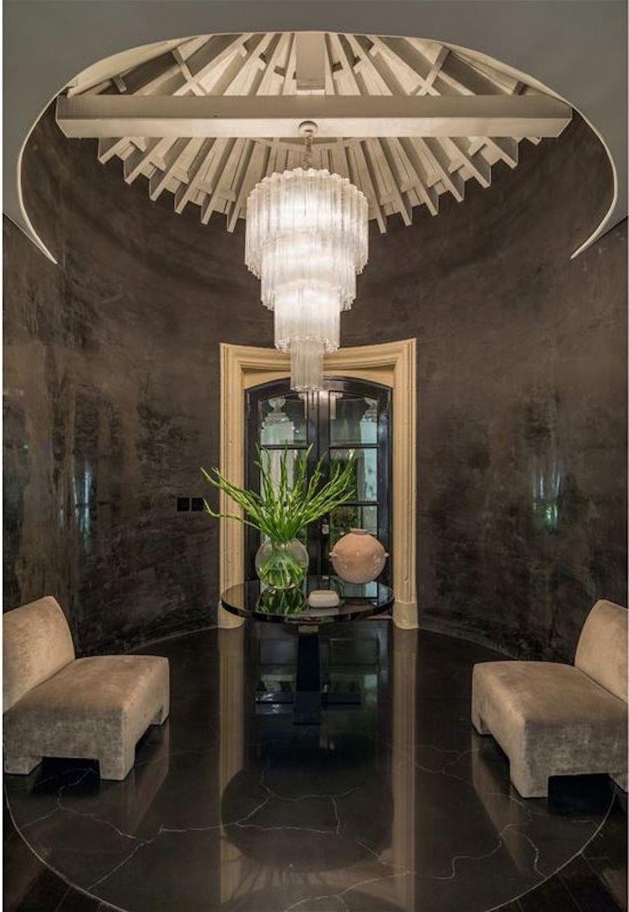 This extraordinary pair of chandeliers is composed by 78 'Tronchi' by 40 cm high.
Eighteen-light bulbs E 14.
Measure: Height 160 cm without chain.
This light fixture can be disassembled and the glasses individually wrapped for easy transport. We