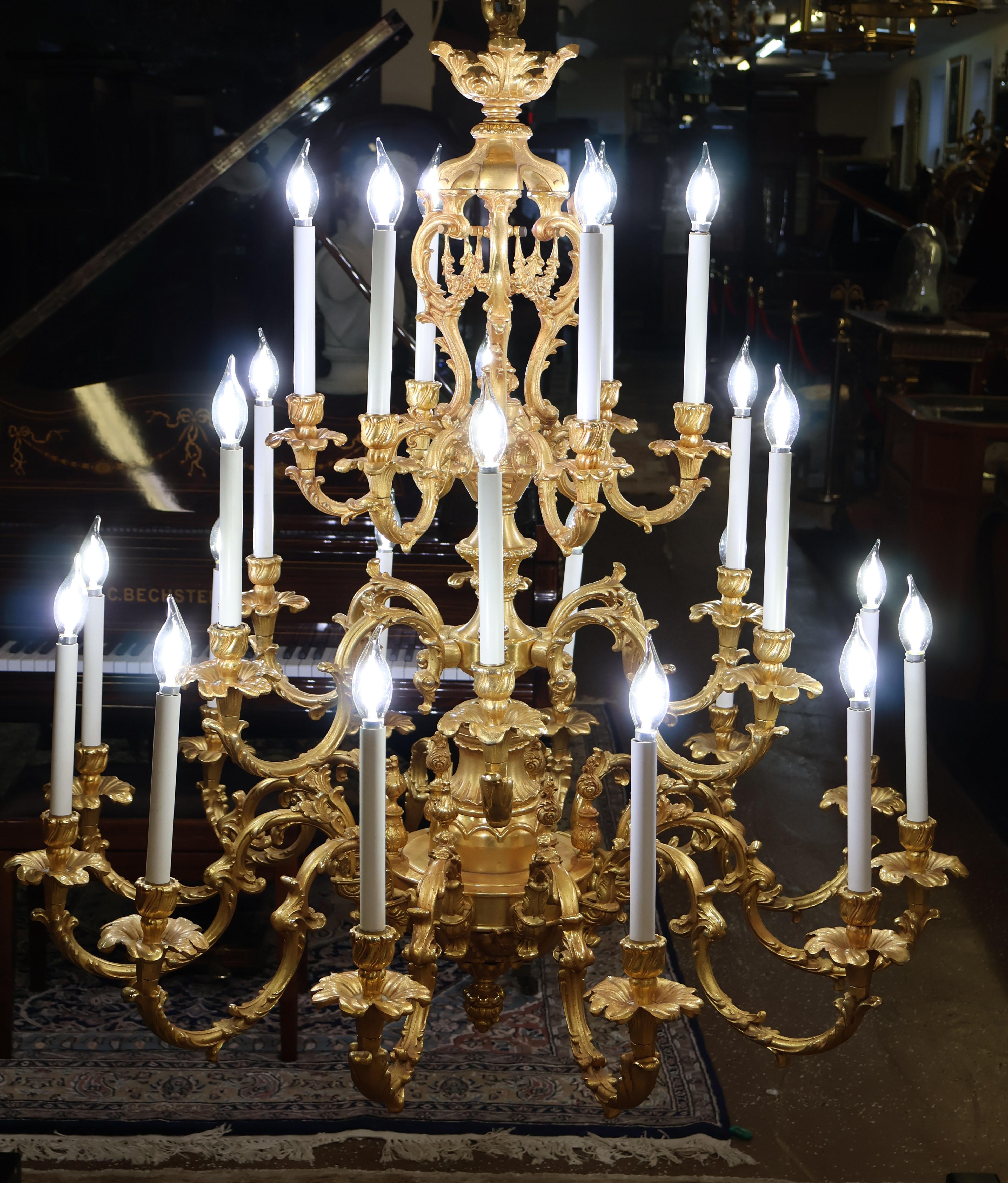 ​Monumental Italian Rococo Style 20 Light Bronze Gold Gilt Chandelier By FBAI

Dimensions : 42 X 42 X 42

This chandelier was made by FBAI in Italy in the rococo style and is superb quality! The bronze is finely cast and the gold dore is stunning!