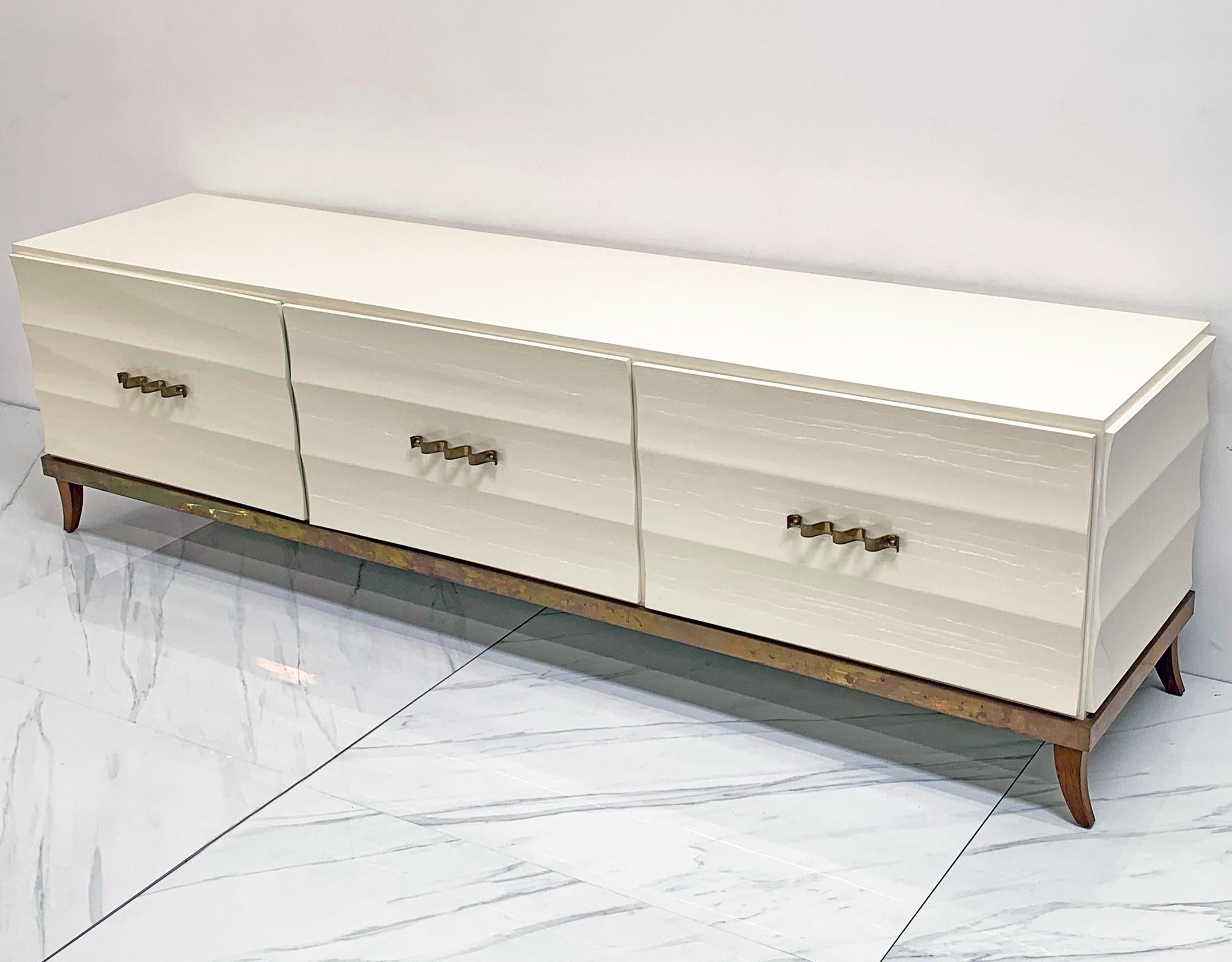 Hollywood Regency Monumental Ivory Lacquered and Aged Brass Credenza Style of Tommi Parzinger For Sale