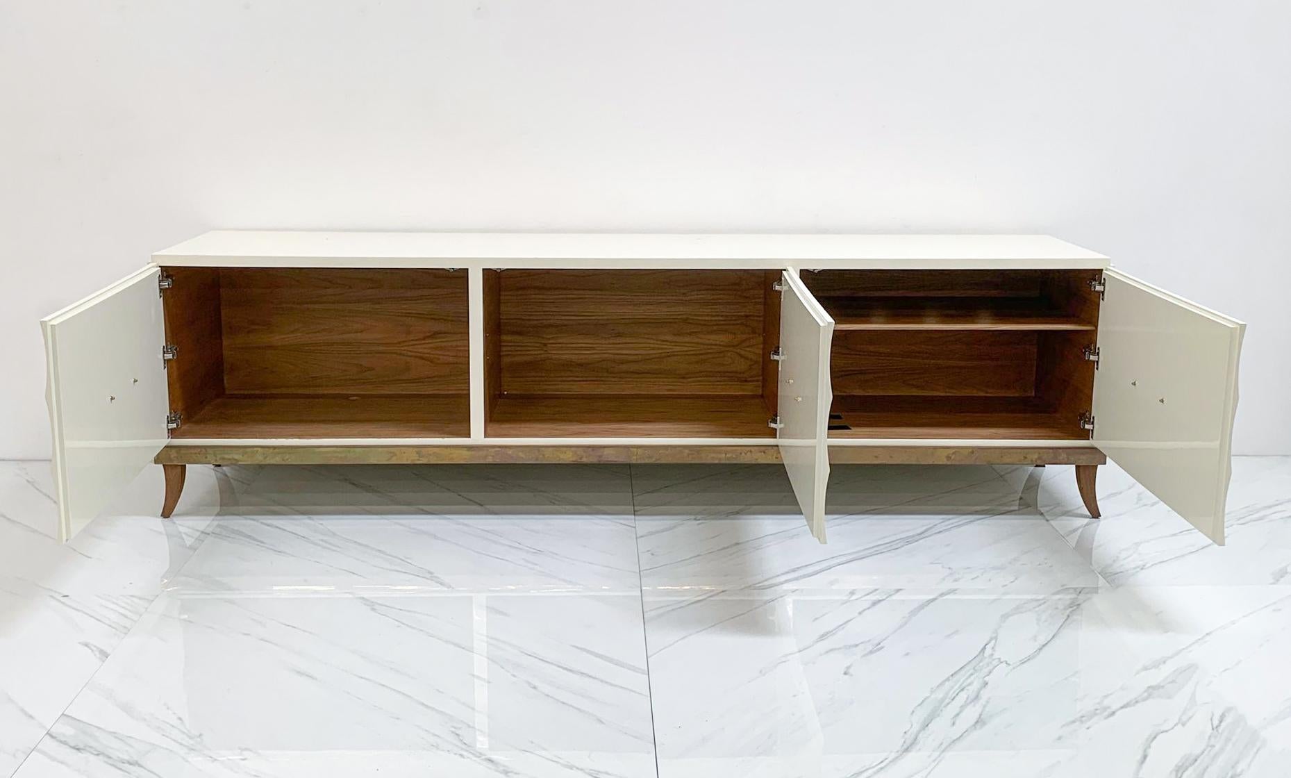 Contemporary Monumental Ivory Lacquered and Aged Brass Credenza Style of Tommi Parzinger For Sale
