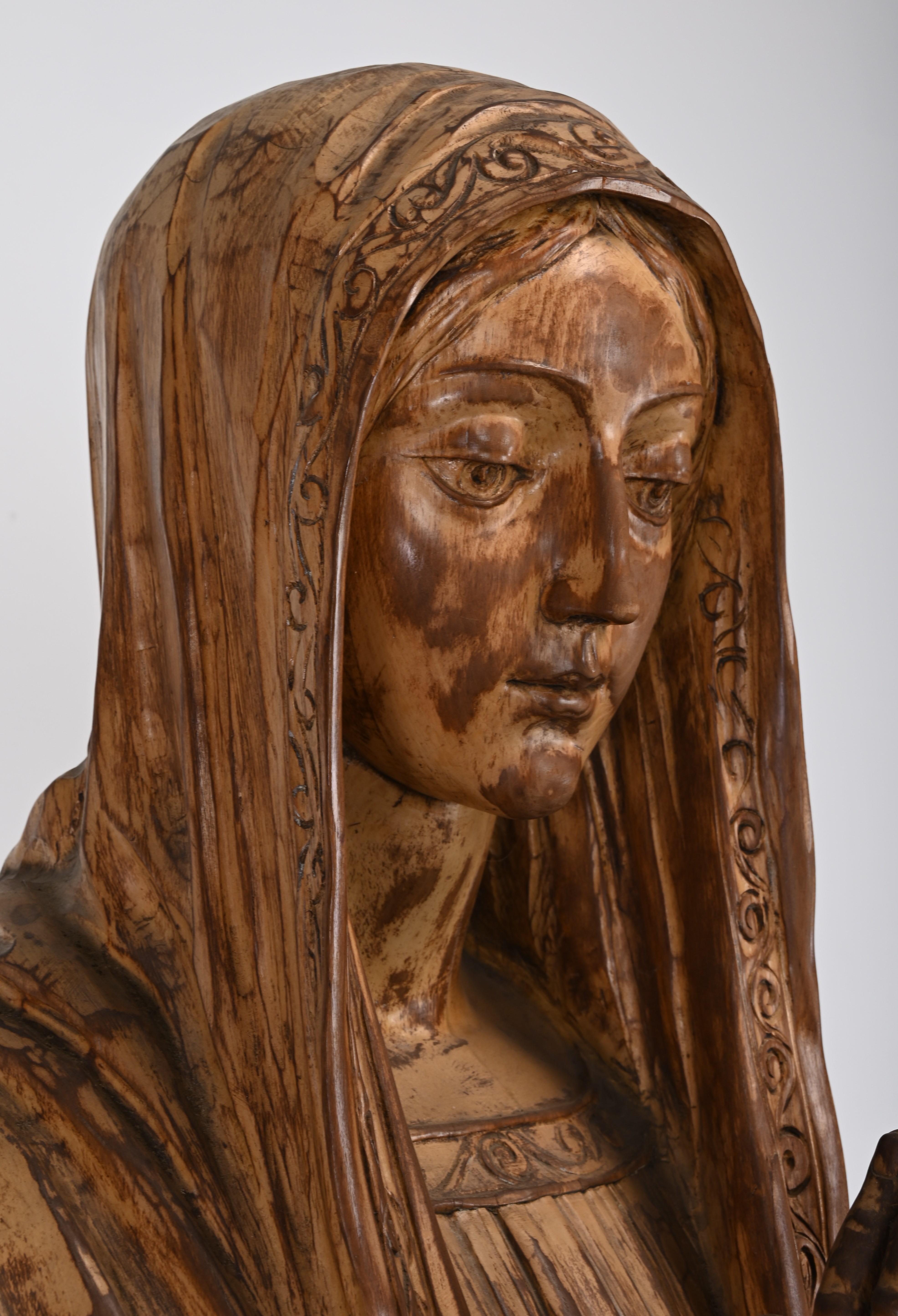 Wood Monumental Jesus and Virgin Mary Folk Art Sculptures from the Jesuit Center For Sale