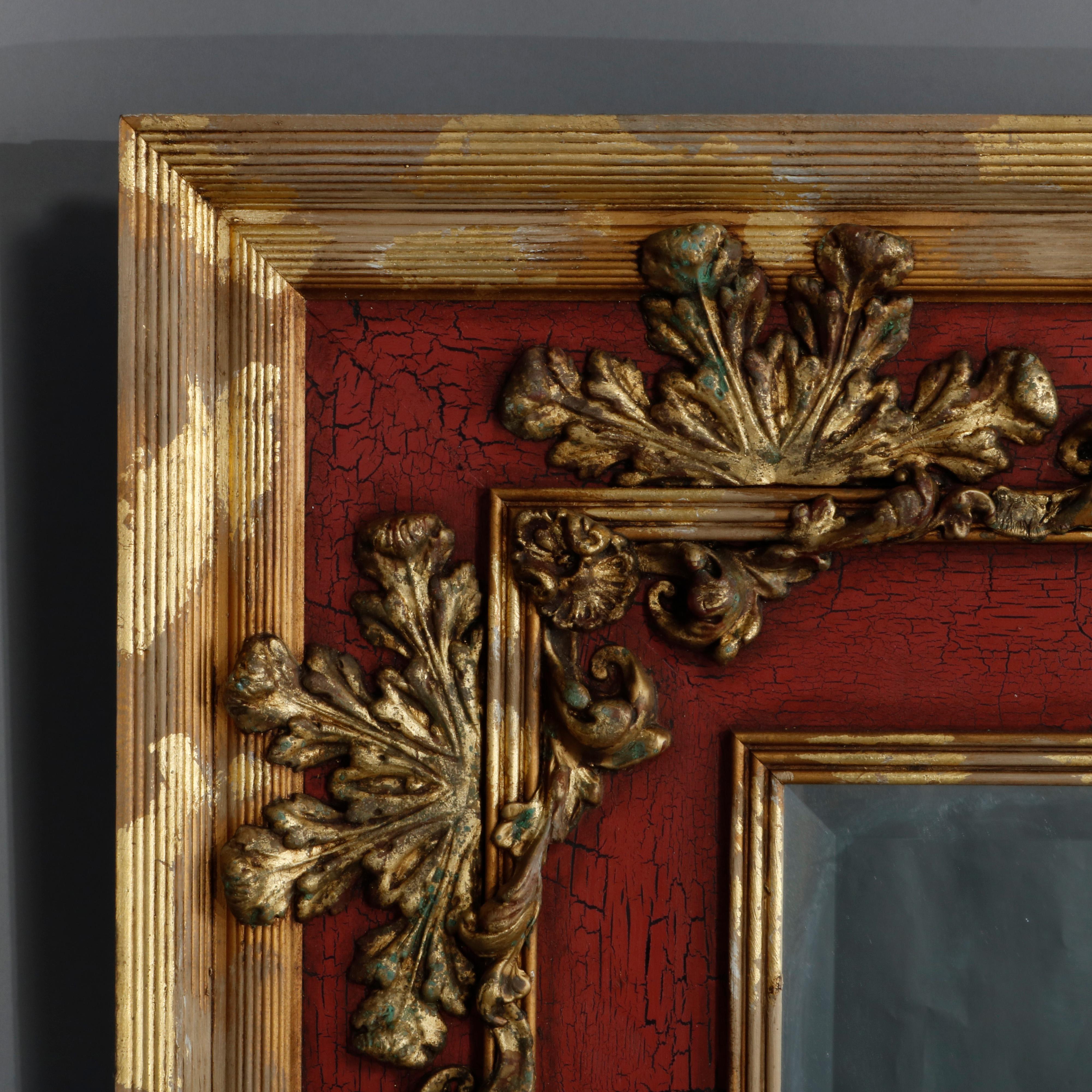 Un miroir de cheminée monumental vintage par John-Richard offre un style néoclassique avec une fausse peinture rouge vermillon et un cadre doré avec des éléments sculptés de feuilles d'acanthe, étiquette du fabricant numérotée à la main comme