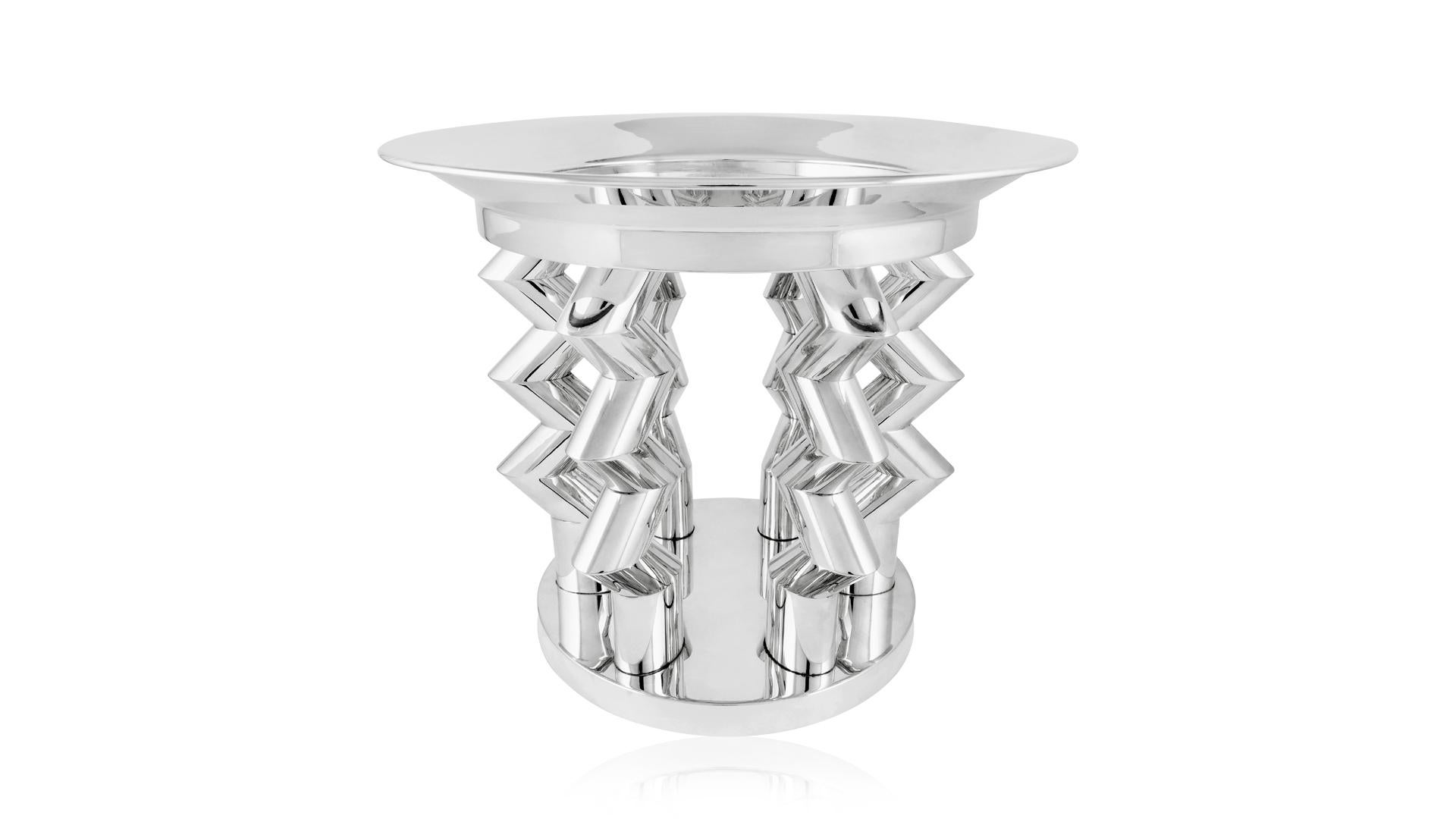 Modern 800 silver centrepiece designed by Ettore Sottsass in 1982 and produced by Rossi & Arcandi for the Memphis Design Group of Milan, Italy. Ettore Sotsass was educated as an architect at the Turin Polytechnic in 1939. He made his name working as