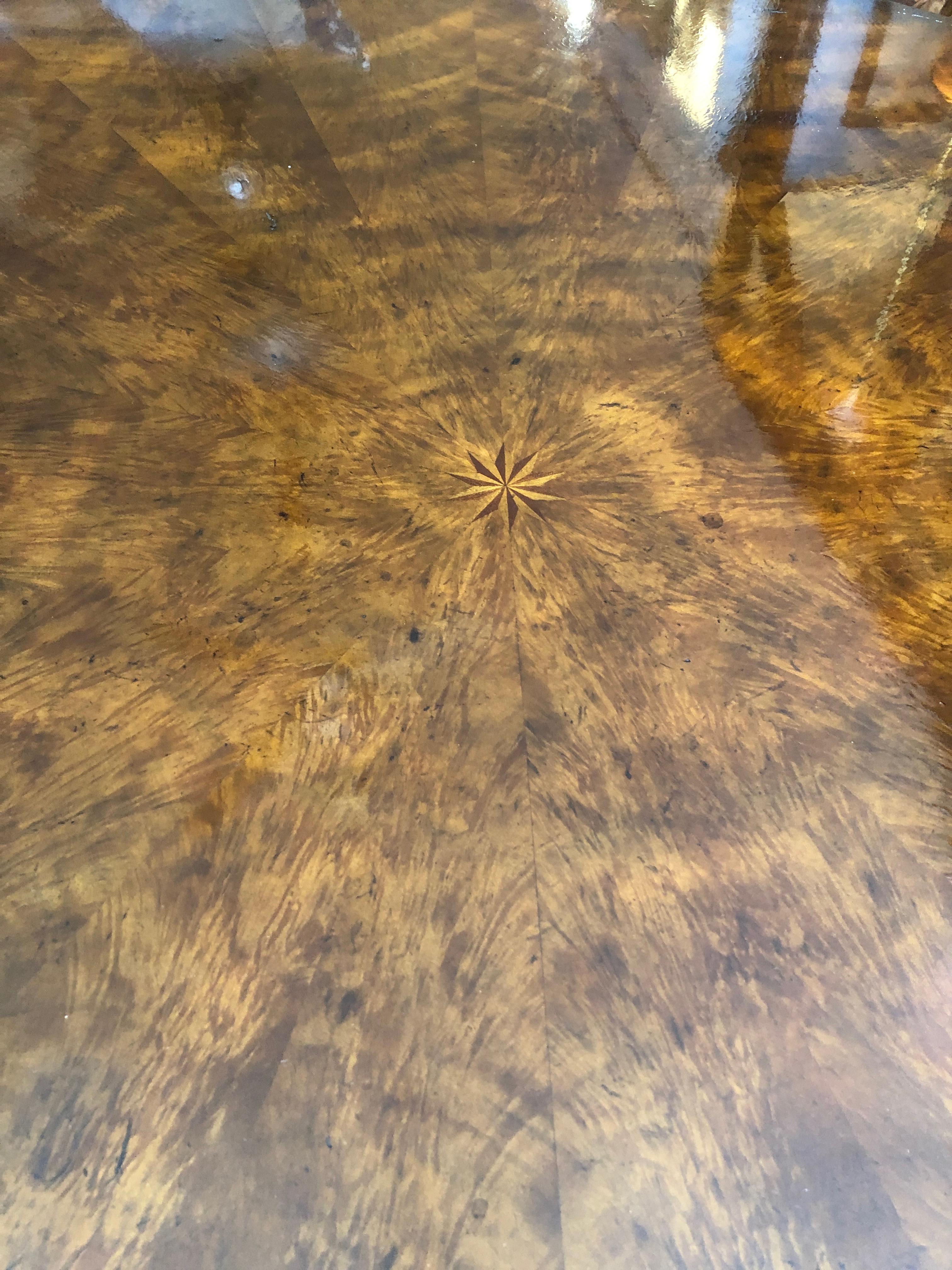 North American Monumental Large Round Crotch Mahogany Dining Table with Peripheral Leaves
