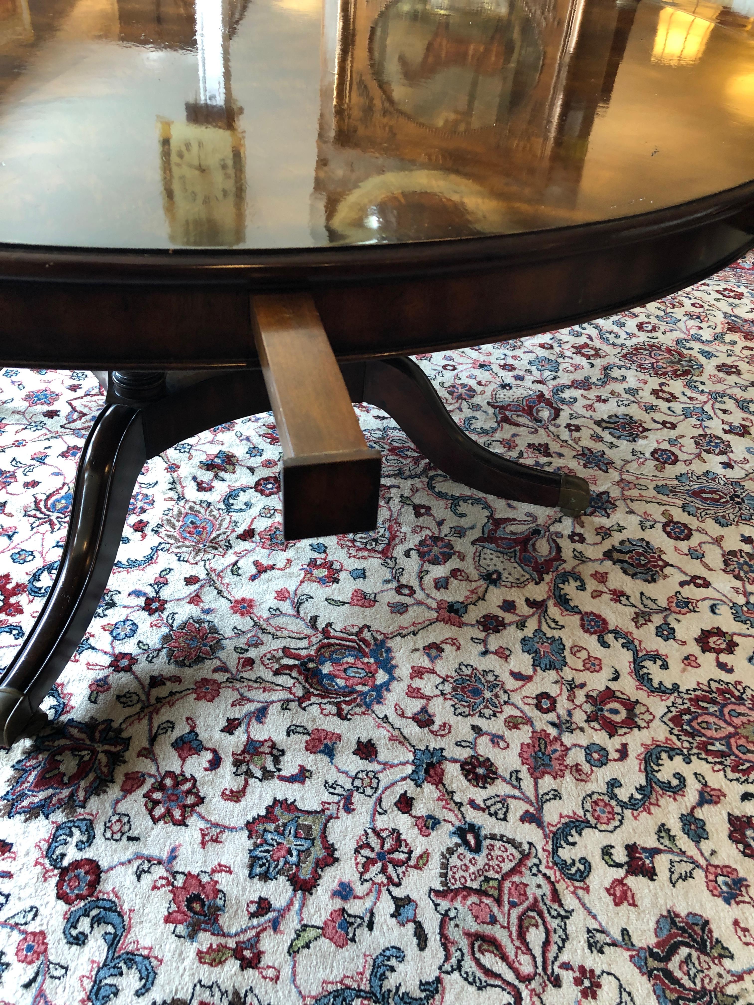 Mid-20th Century Monumental Large Round Crotch Mahogany Dining Table with Peripheral Leaves