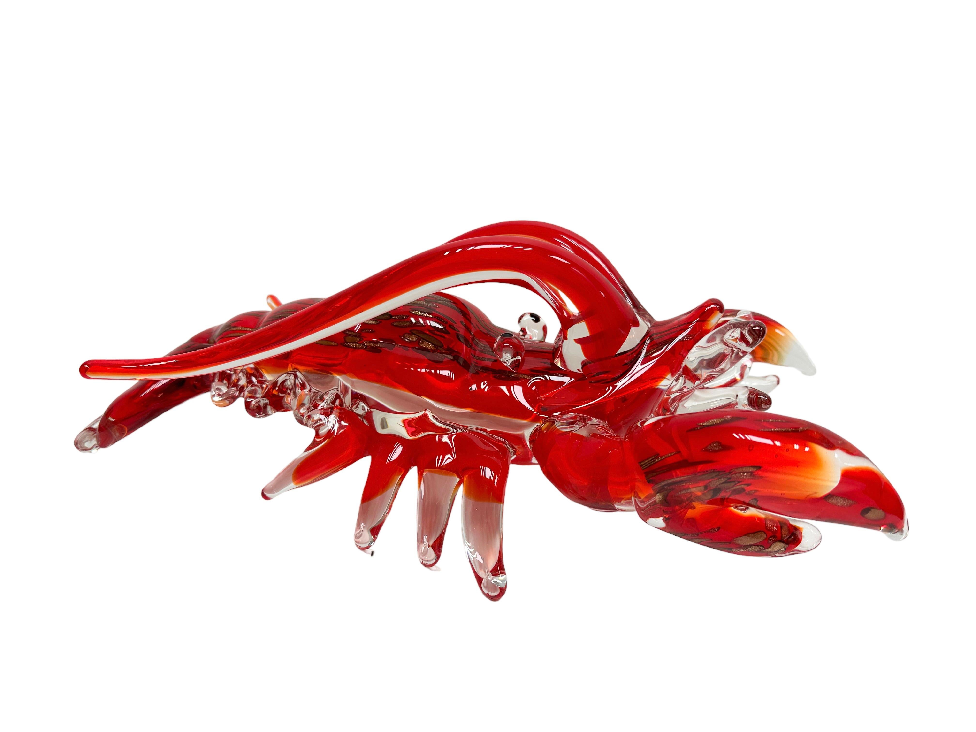 This Murano glass lobster statue was most likely made in the 1980s in Italy. Murano glass is a type of glass that is made on the Venetian island of Murano, located in the northern part of the Venetian lagoon. It is known for its intricate and