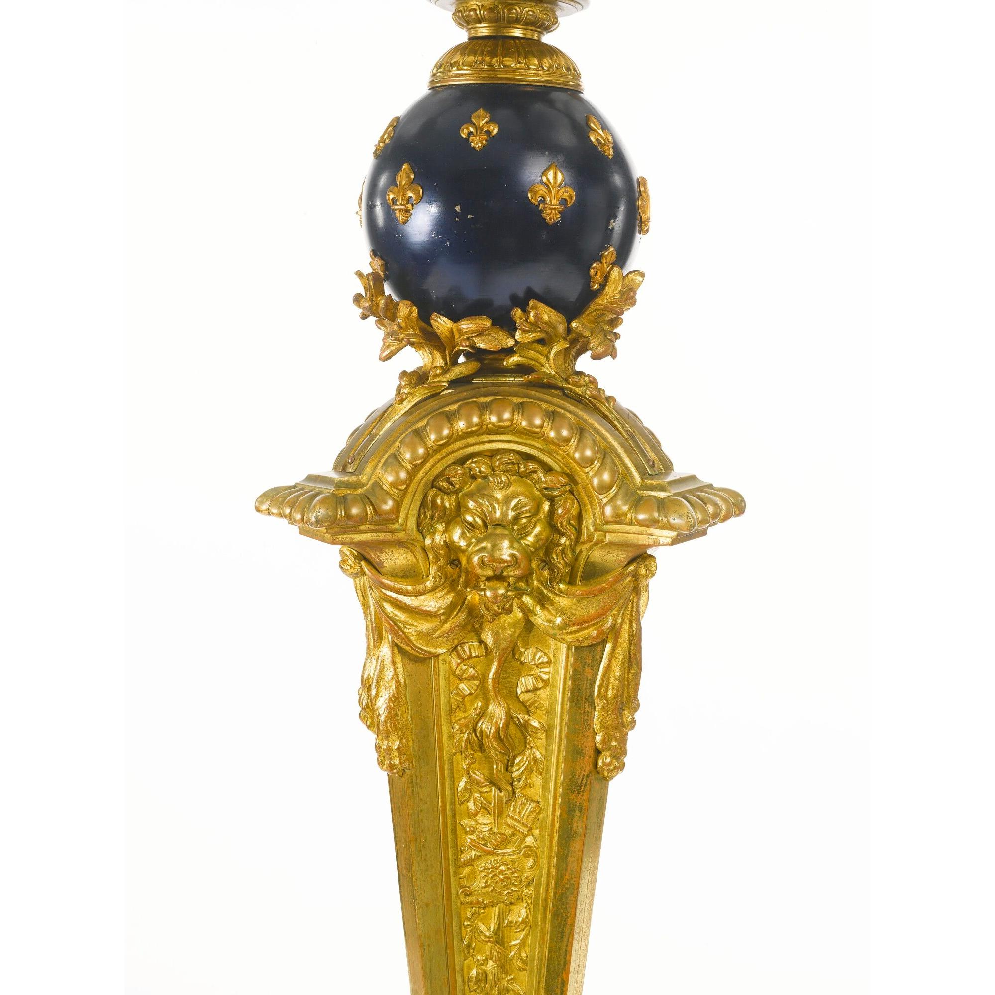 A fine quality monumental Louis XIV style gilt bronze and blue steel six-light floor torchère on a molded Carrara marble base.

Origin: French
Date: circa 1870
Dimension: 7 ft. 5 in. x 26 in.