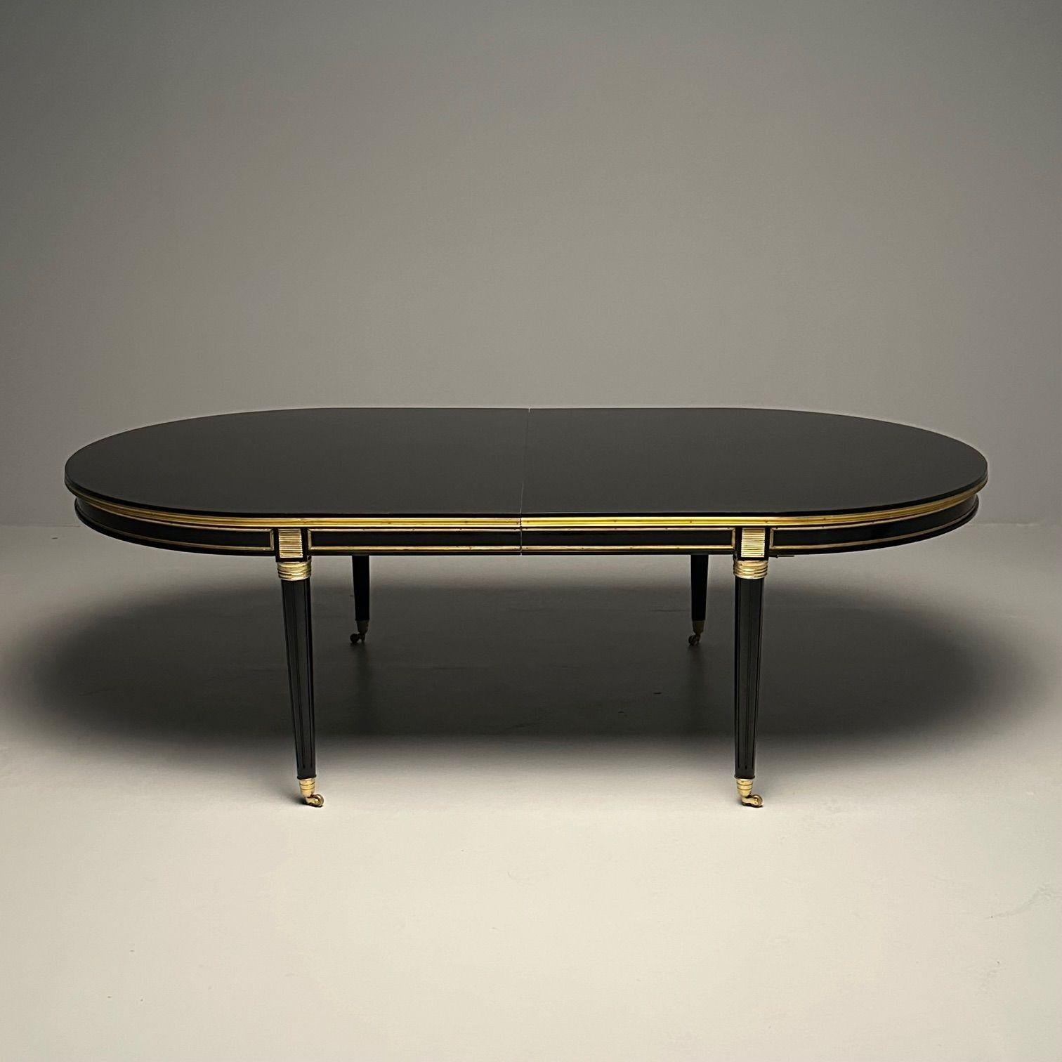 Monumental Louis XVI Hollywood Regency Dining Table, 15 Feet, Bronze Mounted, Maison Jansen Style

Simply Impressive is this larger than life fifteen foot long by 52 inch wide ebonized dining table in the fashion of Maison Jansen. A finely bronze