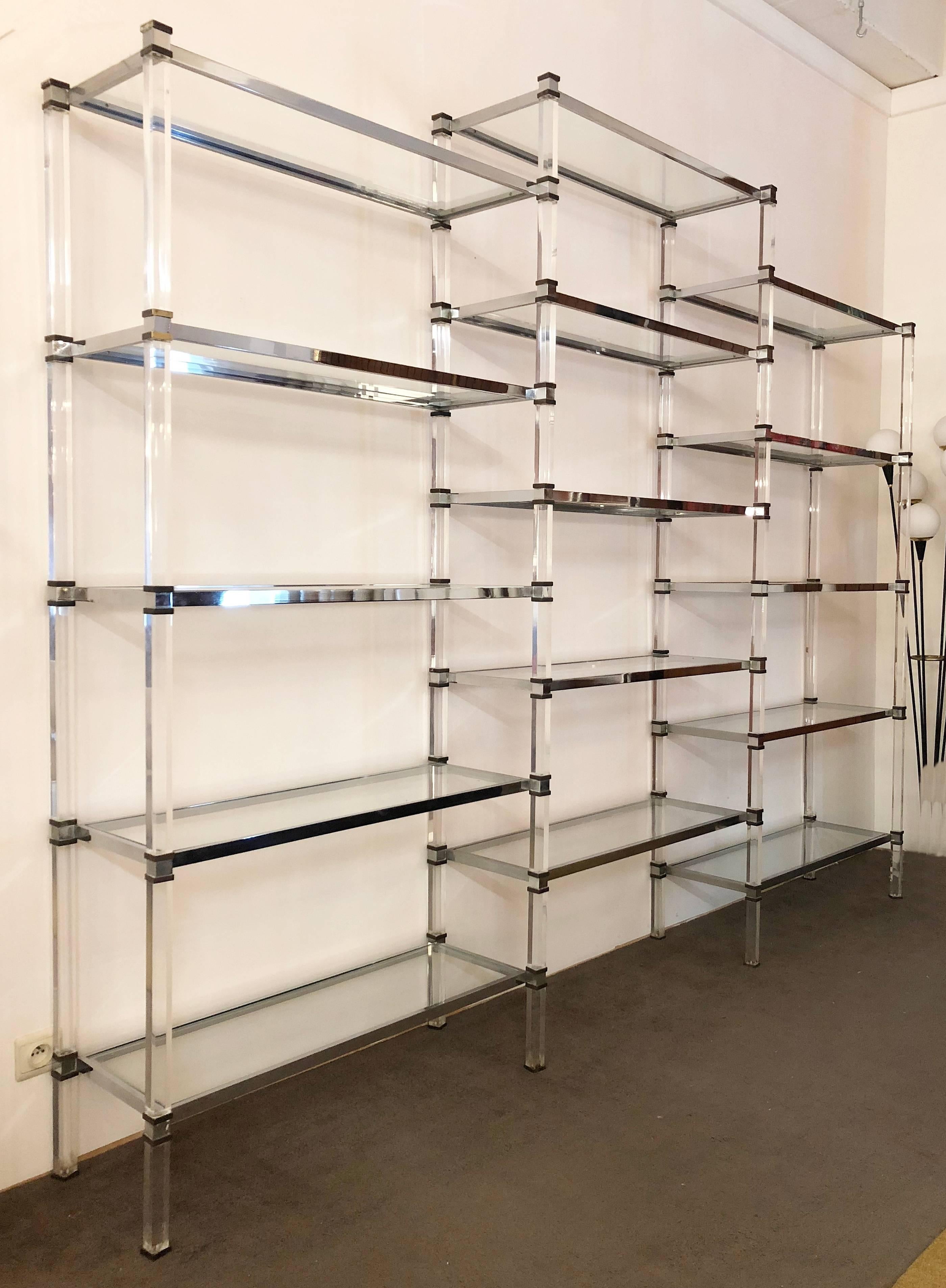 Monumental Lucite, glass, brass and chrome shelving by Romeo Rega, Italy, 1970s.
