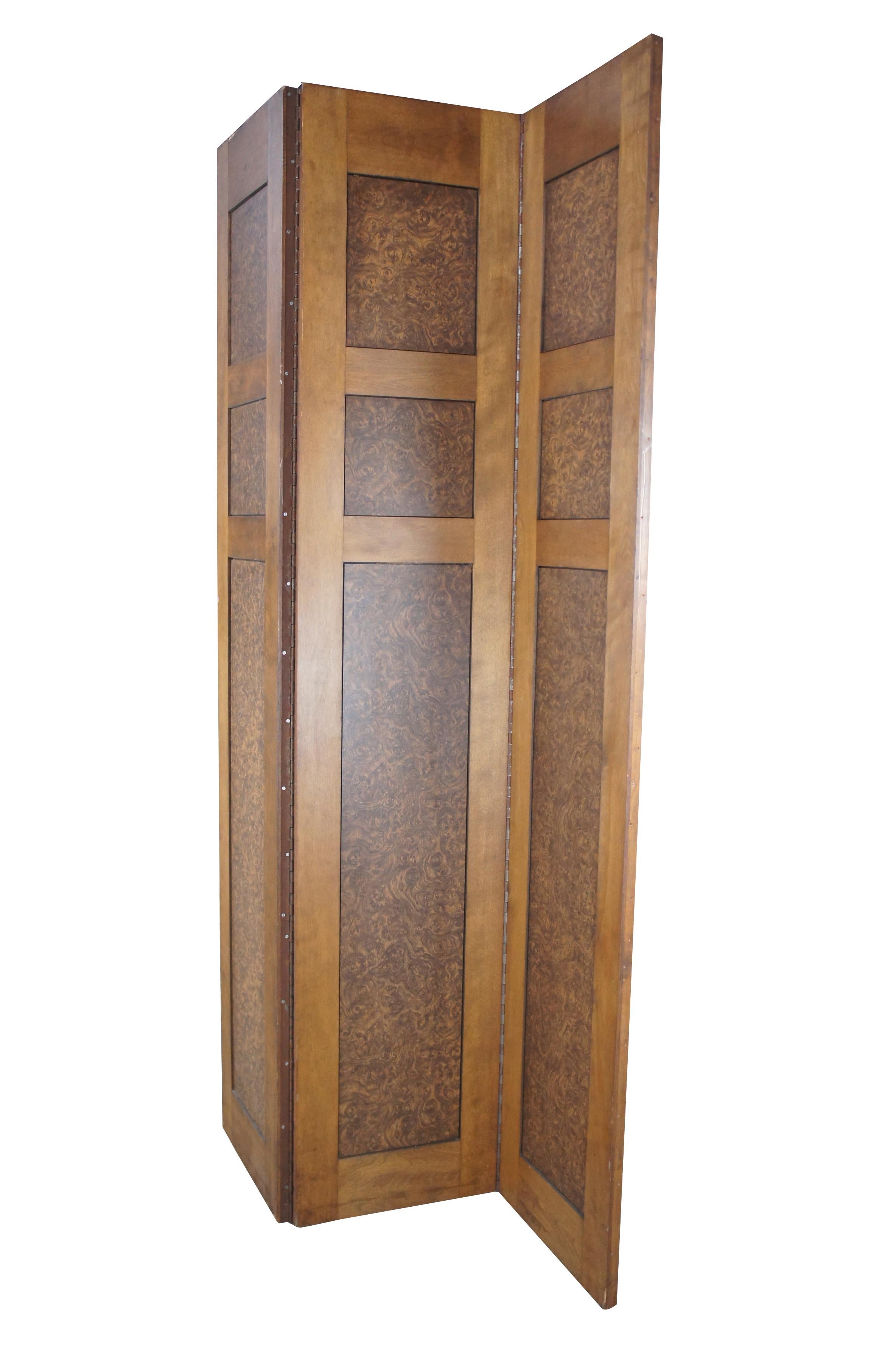 Monumental vintage 3 panel folding screen. Made from mahogany with inset mahogany burl panels. Connect by large iron hinges. A stout piece made to stand the test of time. Measure: 121