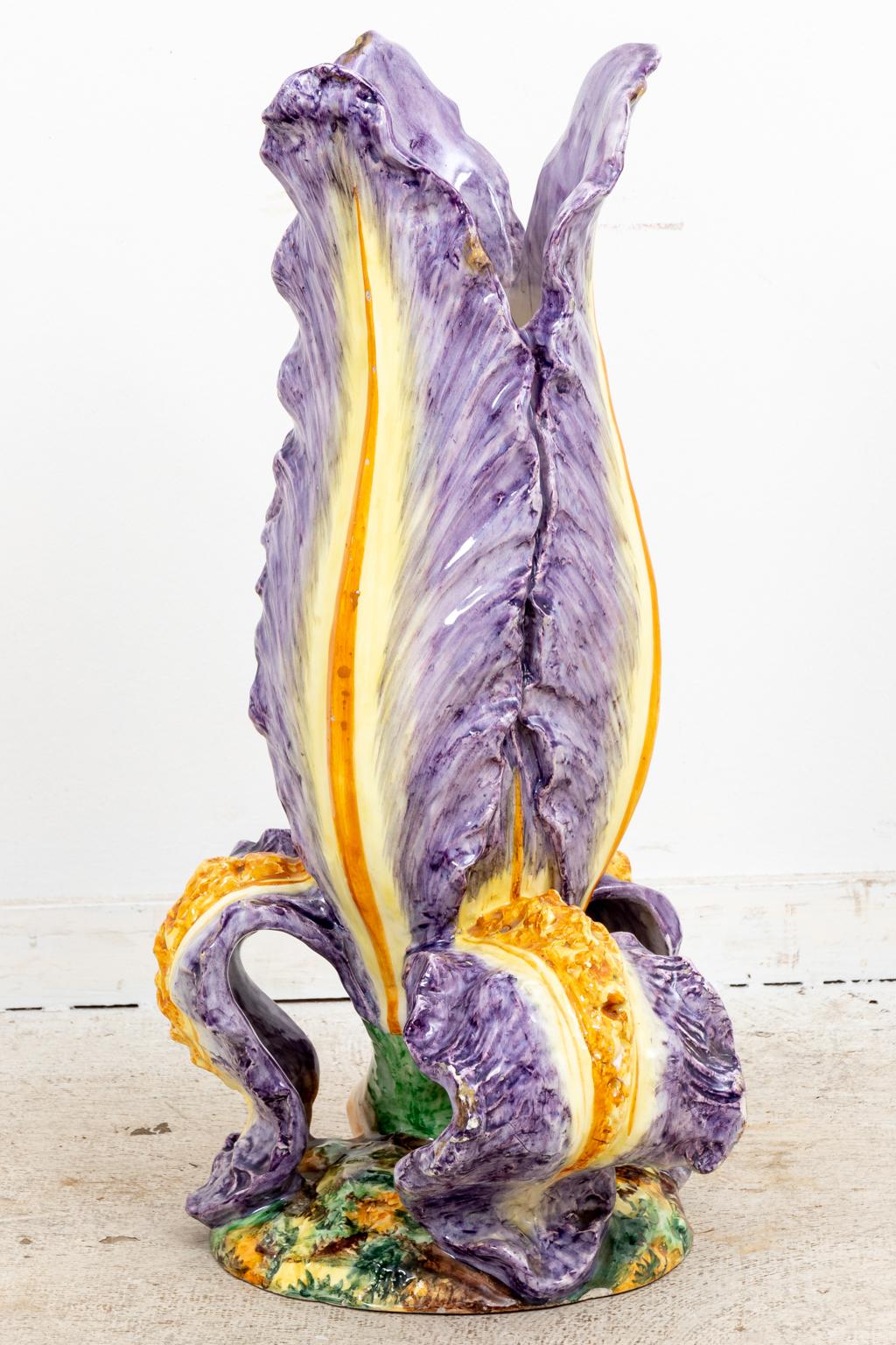 Circa 1890s monumental sized painted Majolica Iris flower form vase or stand in the Art Nouveau style. The piece is detailed with purple and yellow duel tone flower petals in a layered design. Made in Italy. Please note of wear consistent with age.