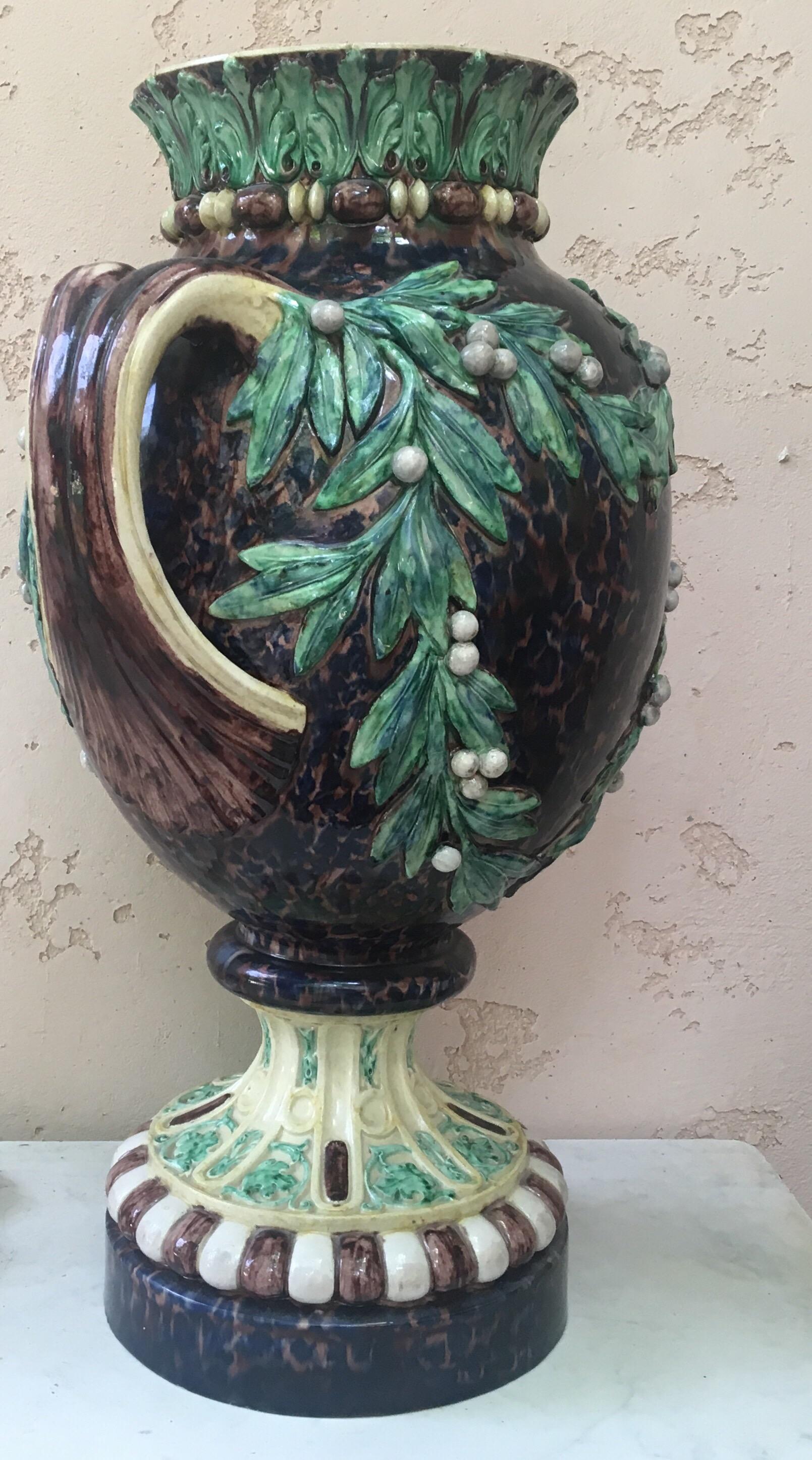 Monumental Palissy handled vase decorated with mistletoe, circa 1880, School of Paris.
Renaissance revival.