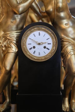 Monumental Marble and Bronze Dore’ Clock Adorned with Psyche and Amor Figures