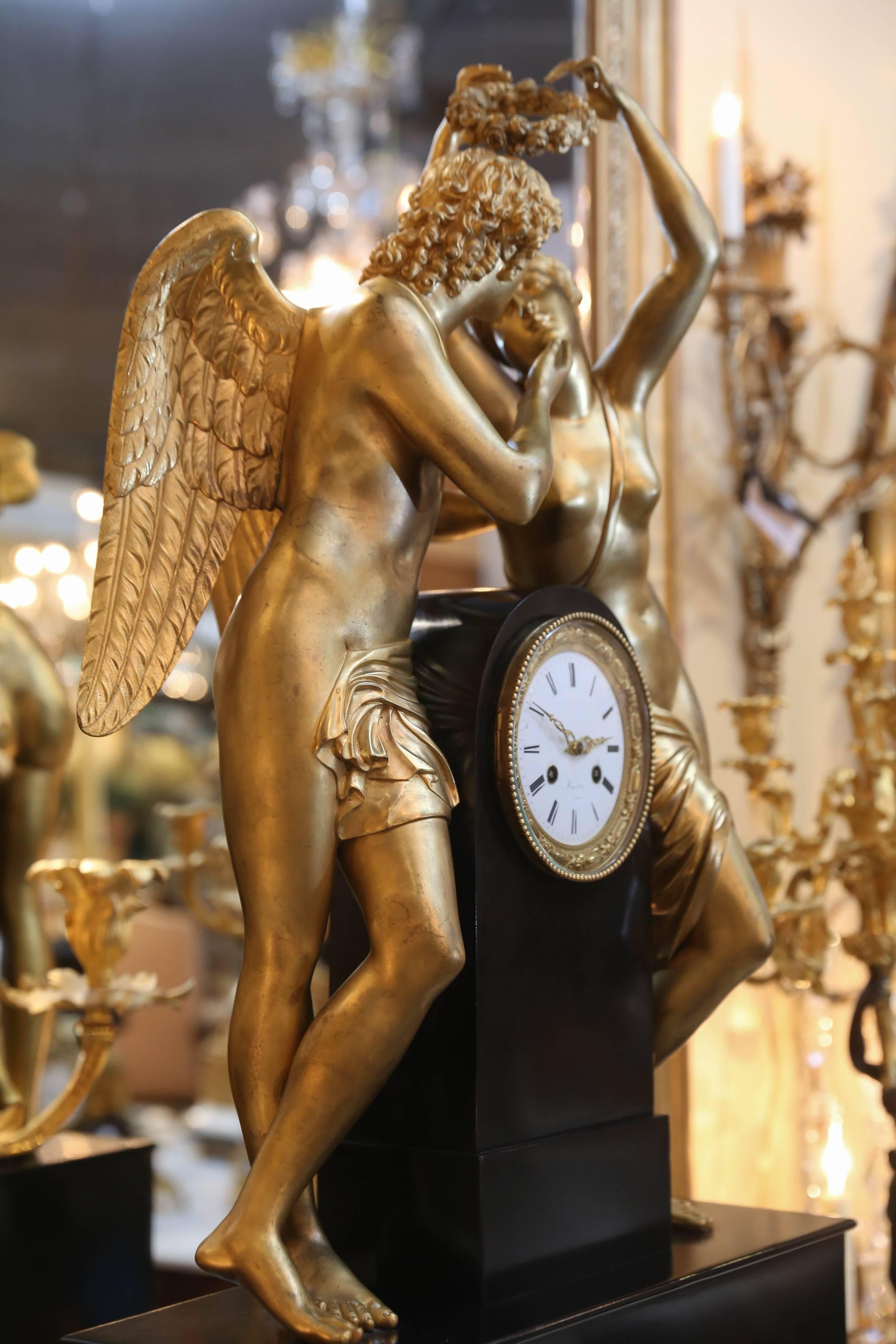 Cast Monumental Marble and Bronze Dore’ Clock Adorned with Psyche and Amor Figures