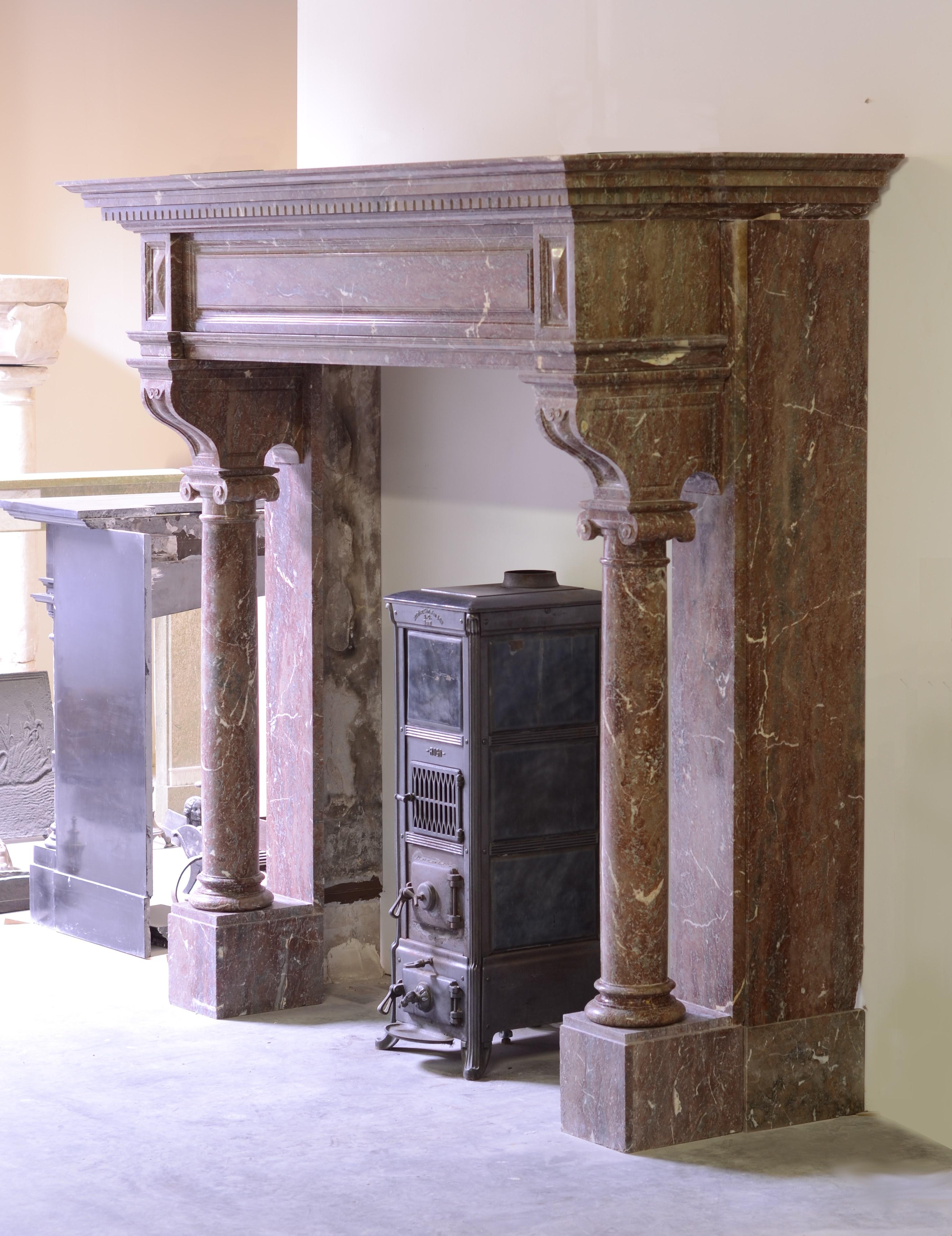 Large Dutch neo-Renaissance antique fireplace mantel, very impressive and grande. 19th century.
Marble pillars and frieze are made from beautiful Belgian red marble.

 