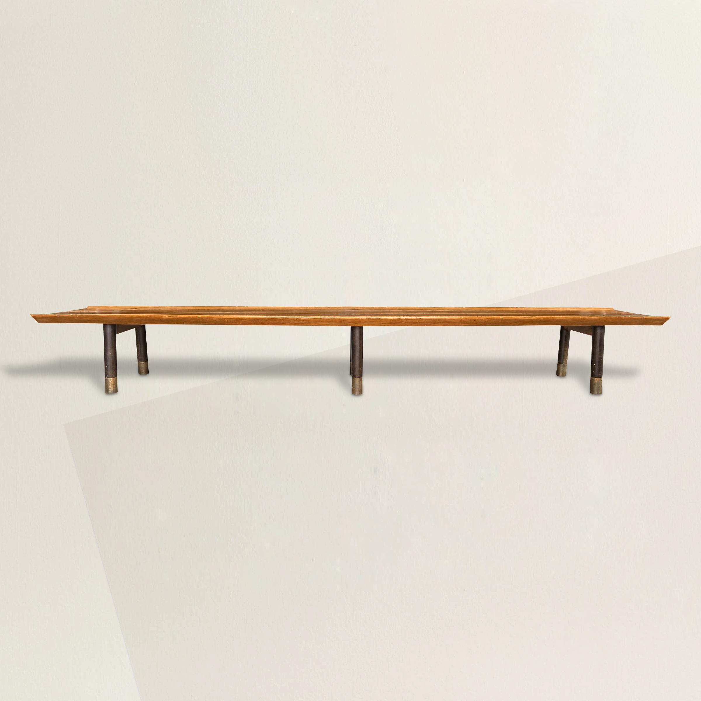 A monumental mid-20th century American hall bench designed by architect Boyd Hill for a private residence built in Lake Forest, IL in 1959. Hill completed several commercial projects, most notably the Aragon Ballroom in Chicago, and did few