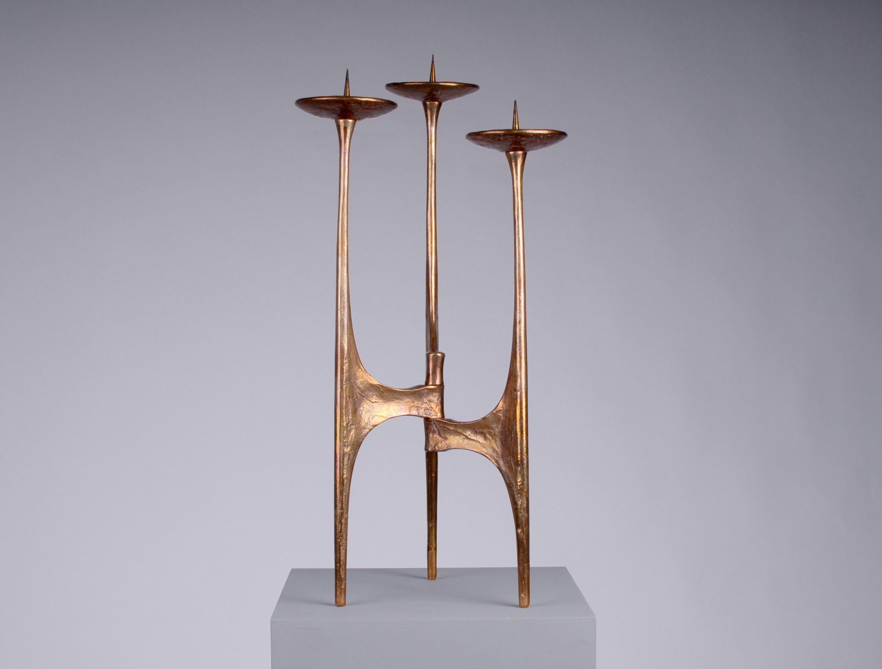 Mid-Century Modern bronze monumental candelabra by Harjes, Germany, late 1970.
Authentic and old candlestick in massive moulded and worked bronze handcrafted by Harjes in Germany. Heavy and steady piece. High quality traditional craftsmanship.