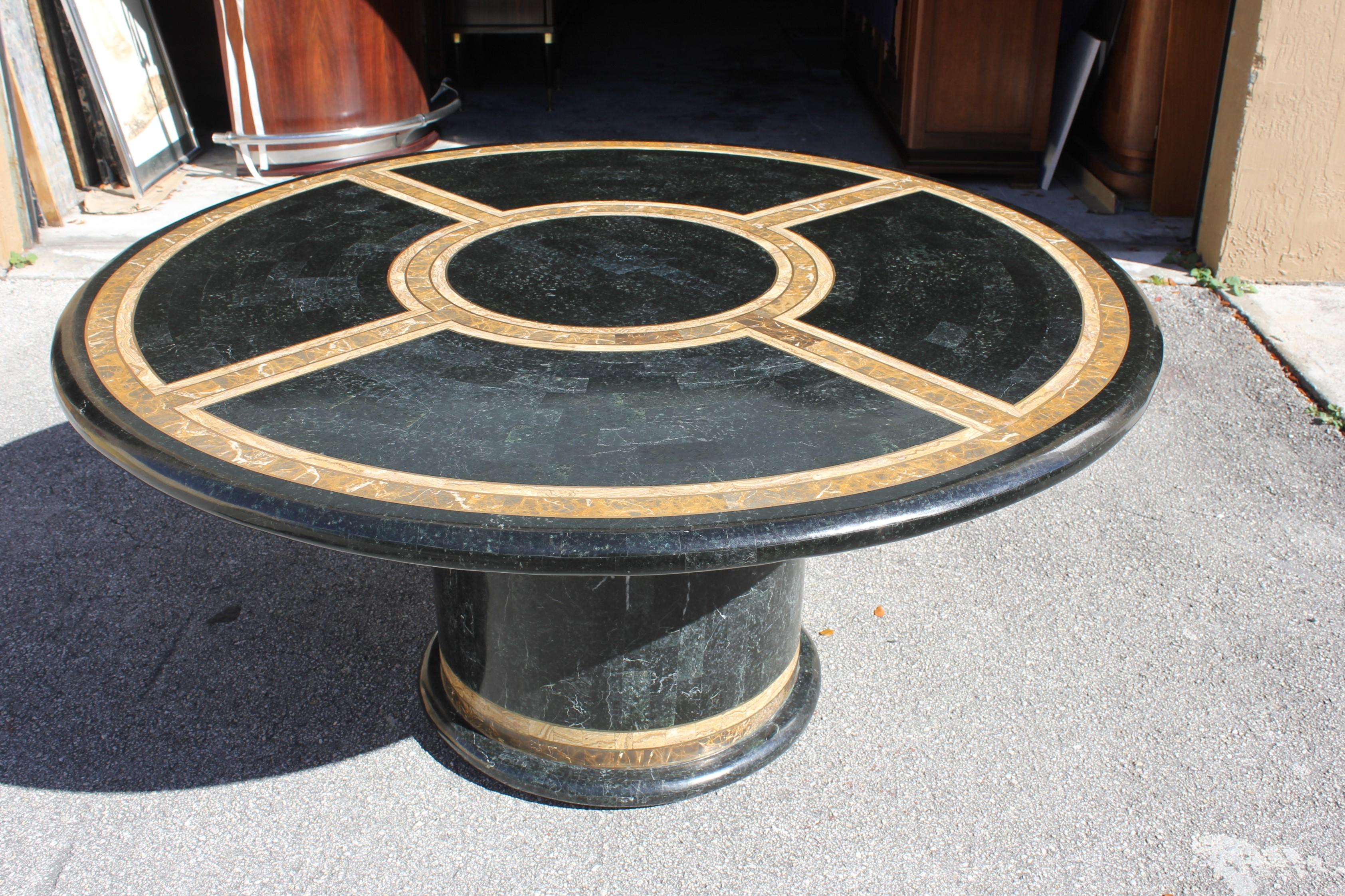 Monumental Mid-Century Modern Maitland Smith tessellated stone Round dining table or center table Made in the 1970s.The dining or center table is beautiful with three color of tessellated stone. Brown color and dark green color and light brown