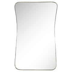 Monumental Mid-Century Modernist Brass Curvilinear Hourglass Form Wrapped Mirror