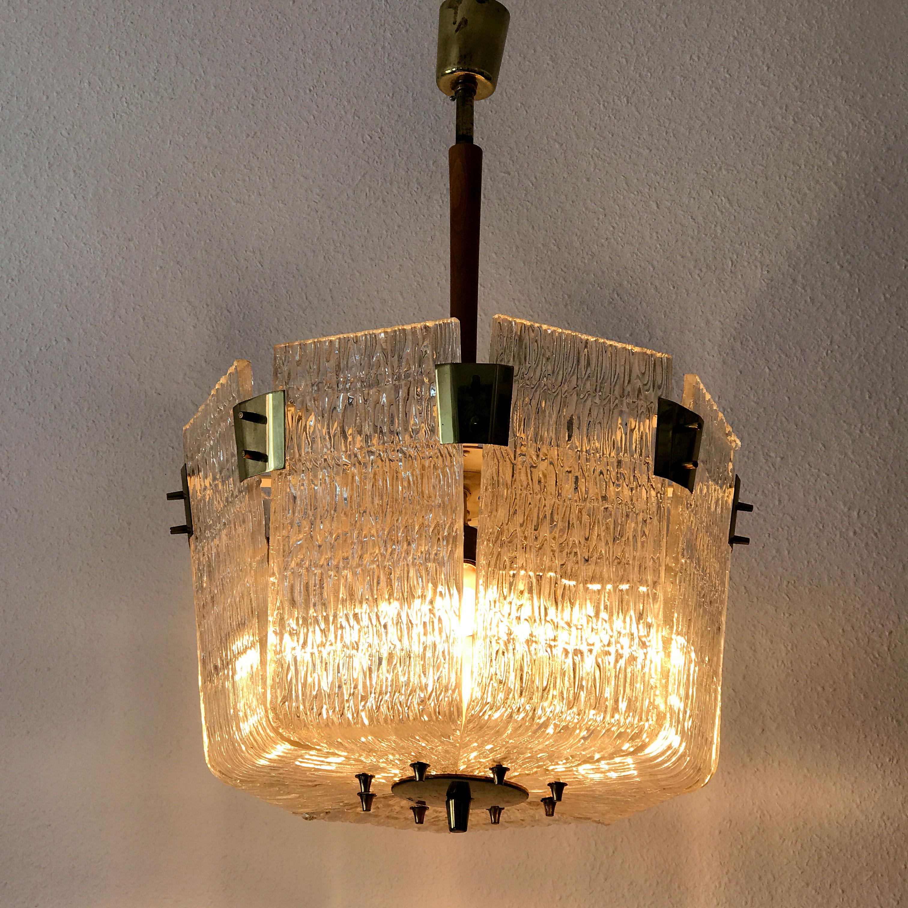 Gorgeous Mid-Century Modern 4-flamed basket chandelier or pendant lamp. Designed and manufactured by J.T. Kalmar, Vienna, Austria, 1950s.

Executed with thick frosted glass elements and brass body. The chandelier needs 4 x E127 Edison screw fit