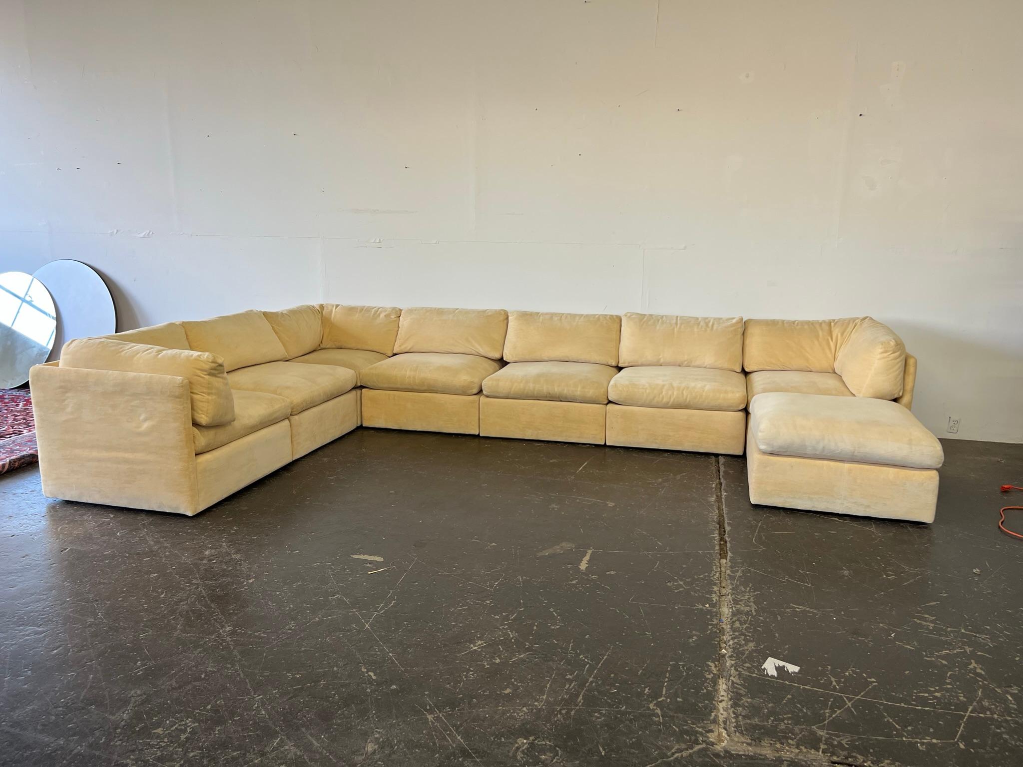 Iconic Milo Baughman for Thayer Coggin 8-piece sectional sofa with ottoman. 3 corner pieces, 4 center pieces, and ottoman. Very good vintage condition - the beige velvet upholstery shows only light wear as shown in photos. Original tags included.