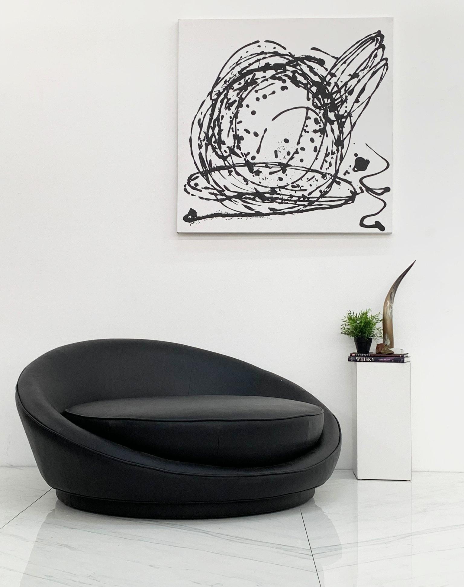 This piece is beyond stunning-- it's as if your favorite, most comfortable sofa had a love child with the most sophisticated papasan chair known to man. This Satellite chaise in the style of Milo Baughman is about sumptuously cozy as it gets.