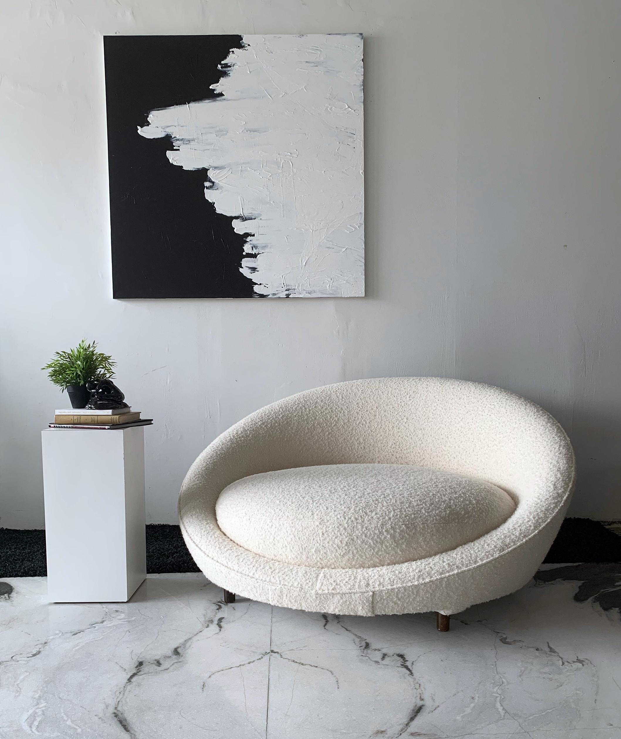 This piece is beyond stunning-- its as if your favorite, most comfortable sofa had a love child with the most sophisticated papasan chair known to man. This Satellite chaise designed by Milo Baughman in the 1950's is about as luxurious as it gets.