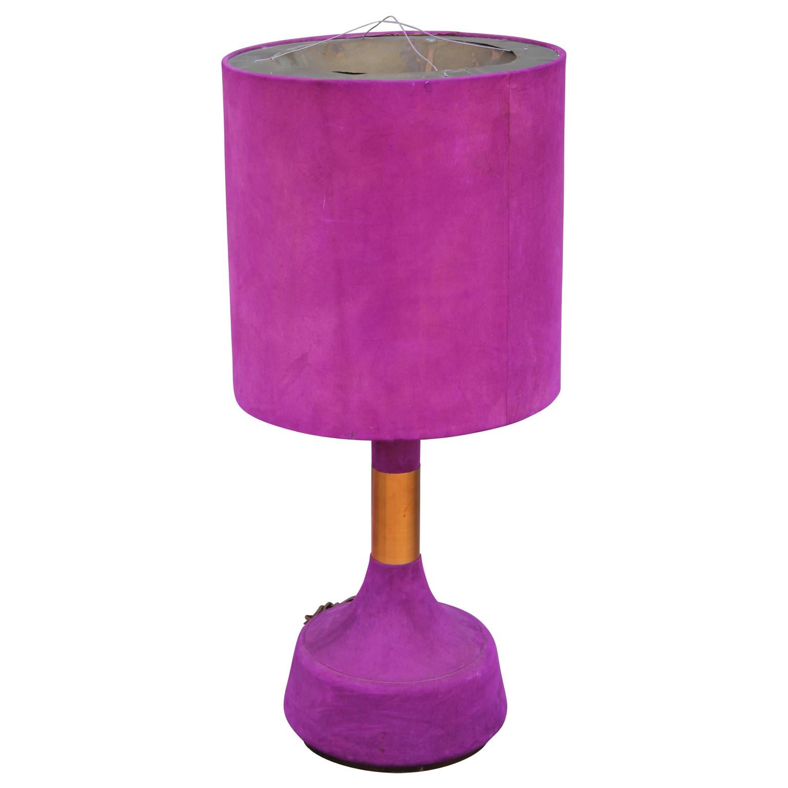 Monumental and stunning table lamp made from copper and brass and covered in a lush vibrant pink or purple or fuchsia suede from the 1960s. Absolutely unique.

Dimensions of the lamp base: 14.5 in. D x 14.5 in. W.
