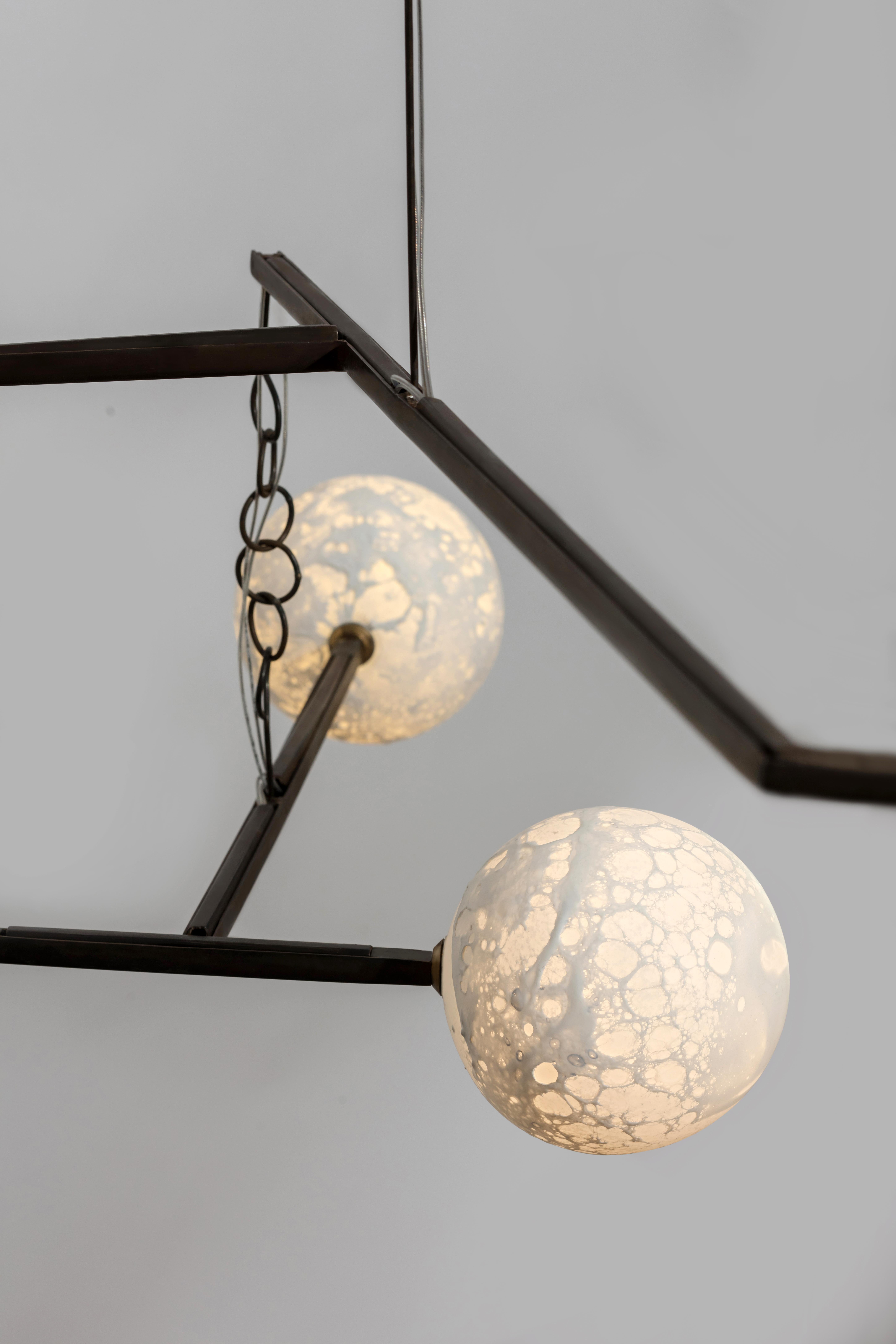 Monumental Moon pendant mobile light - Ludovic Clément d’Armont
Every creation of Ludovic Clément d’Armont can be made to order in any requested dimensions.
Blown glass and metal (can also be made in brass)
Dimensions: 200 x 200 x 200