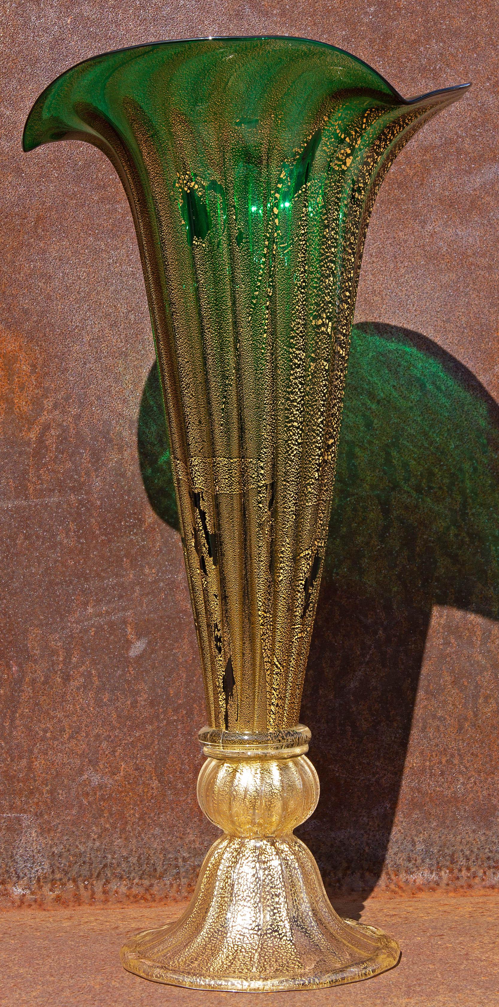 Monumental sculptural Venetian glass vase. Emerald green glass with infused 24-karat gold flakes. Mid-20th century. Measures: 20 1/4