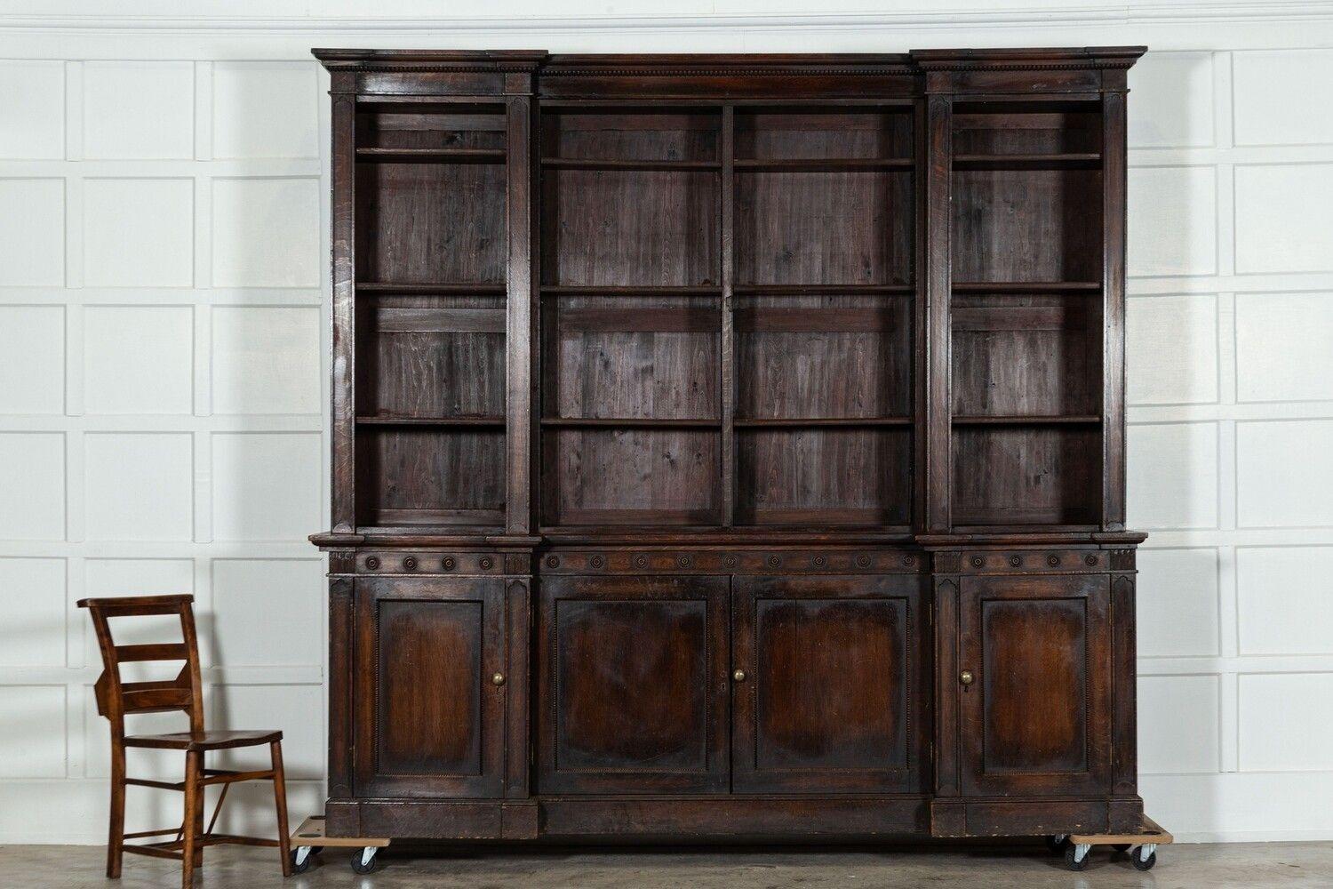19th Century Monumental Oak Inverted Breakfront Bookcase For Sale