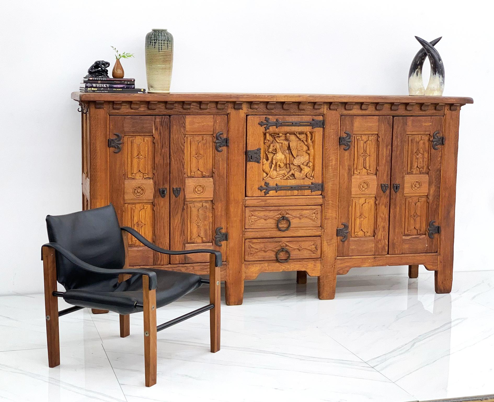 This piece is both monumental and stunning, this fabulous oak buffet is made of solid oak through and through. (This piece is legit solid wood, including the back, and the joinery / attention to wood detail is incredible-- such a craftsman