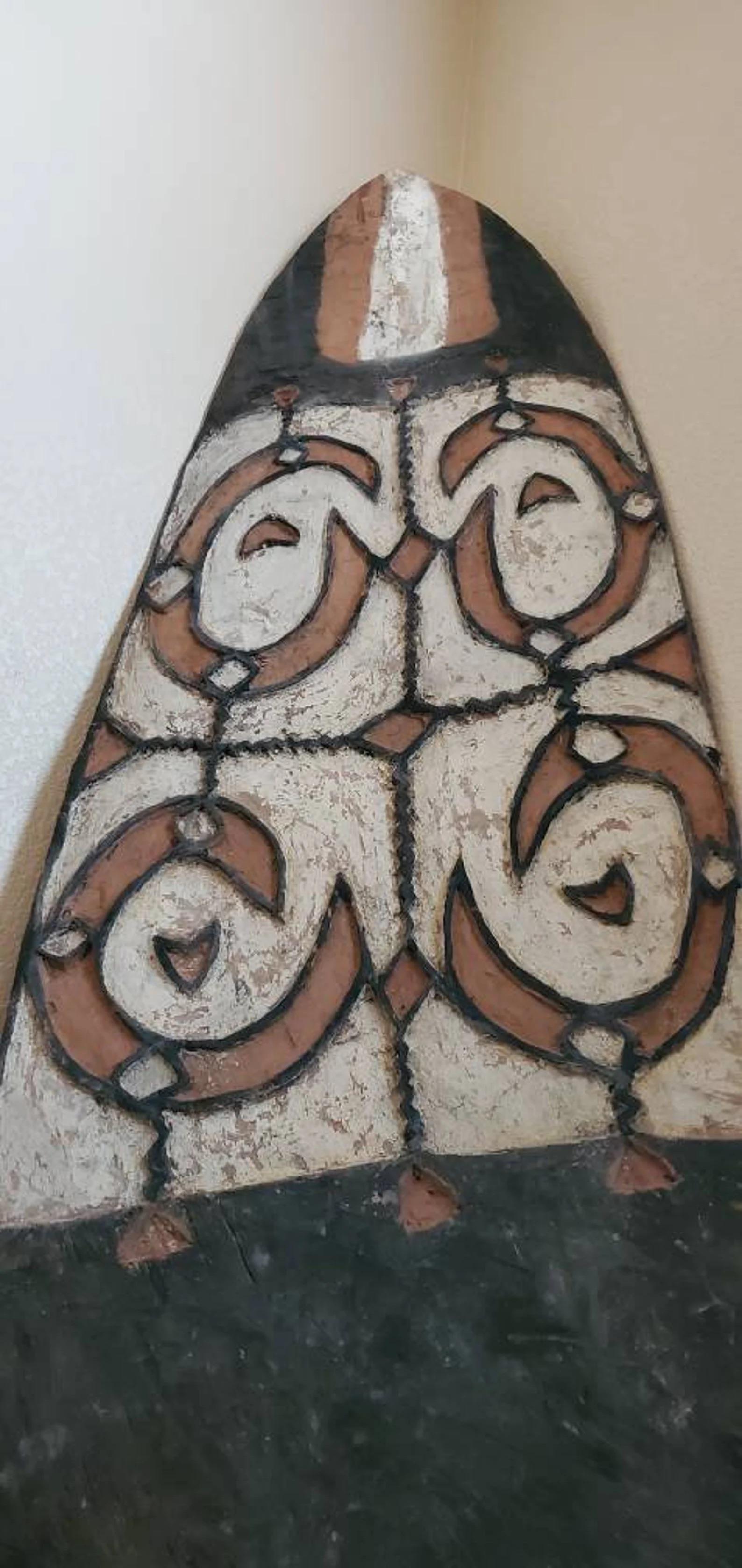 Hand-Carved Monumental Oceanic Asmat People Carved Painted Wooden War Shield For Sale