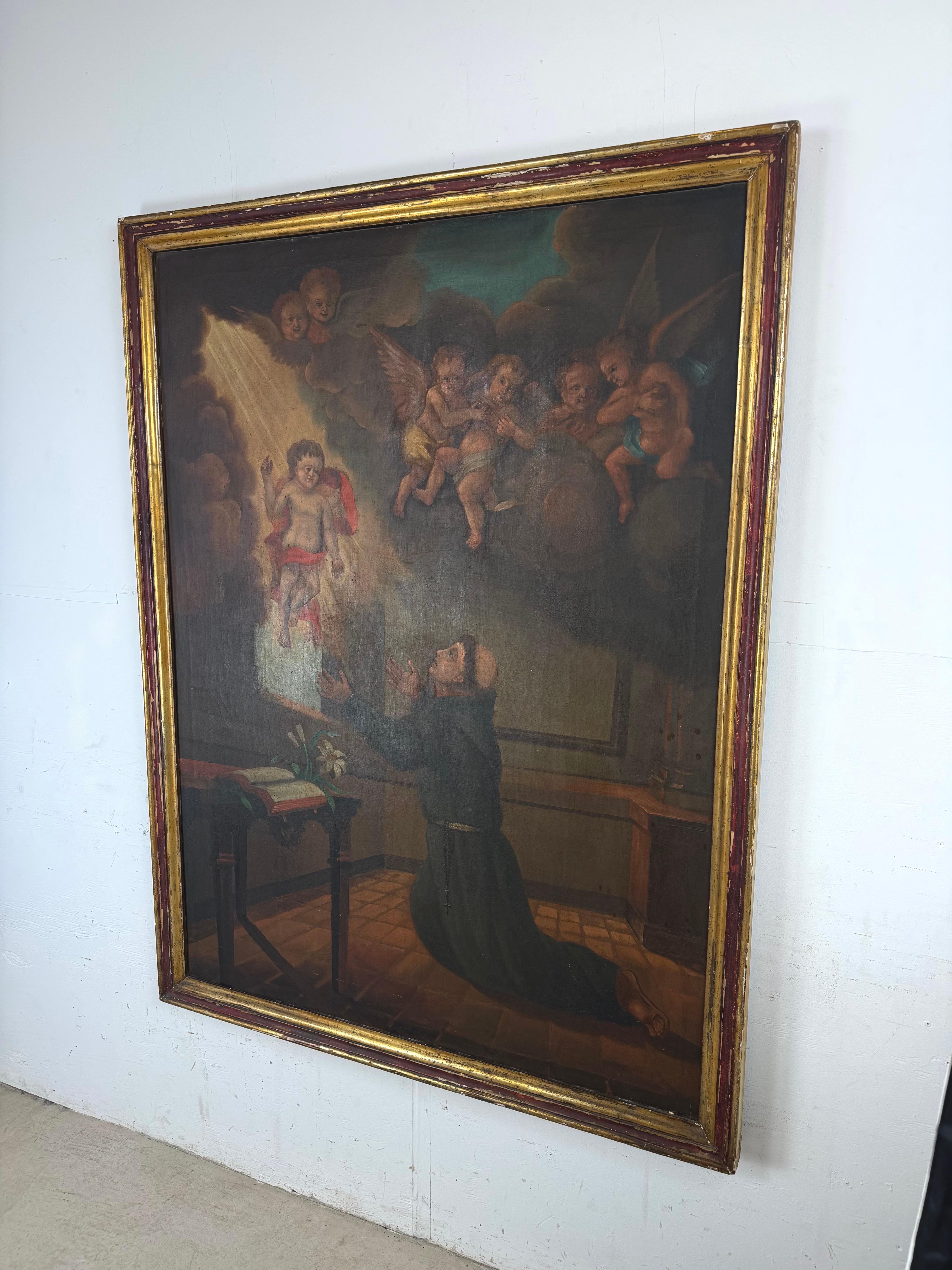 In dieser wunderschön gestalteten Andachtsszene kniet der heilige Antonius von Padua in Ehrfurcht, während über ihm das Christuskind erscheint, begleitet von einer Schar von Putten, die den oberen Teil der Leinwand mit Bewegung und Licht erfüllen.