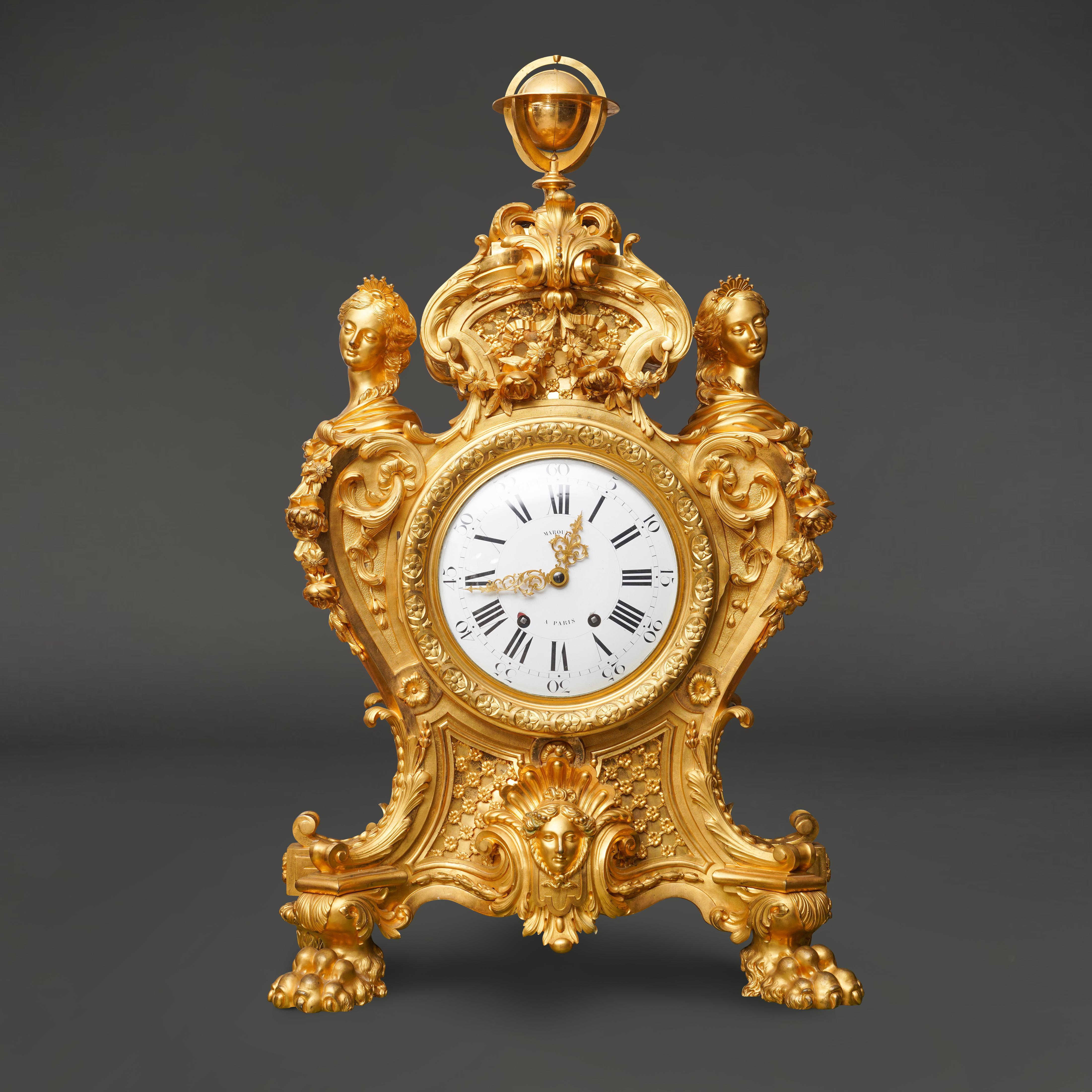 A very fine and monumental 19th century French ormolu bronze mantel clock by Maison Marquis.
The movement by Languereau.

Paris, Circa 1855

The dial signed 'Marquis A Paris';
The movement signed 'Maison Marquis, Chaumont Languereau; twin barrel