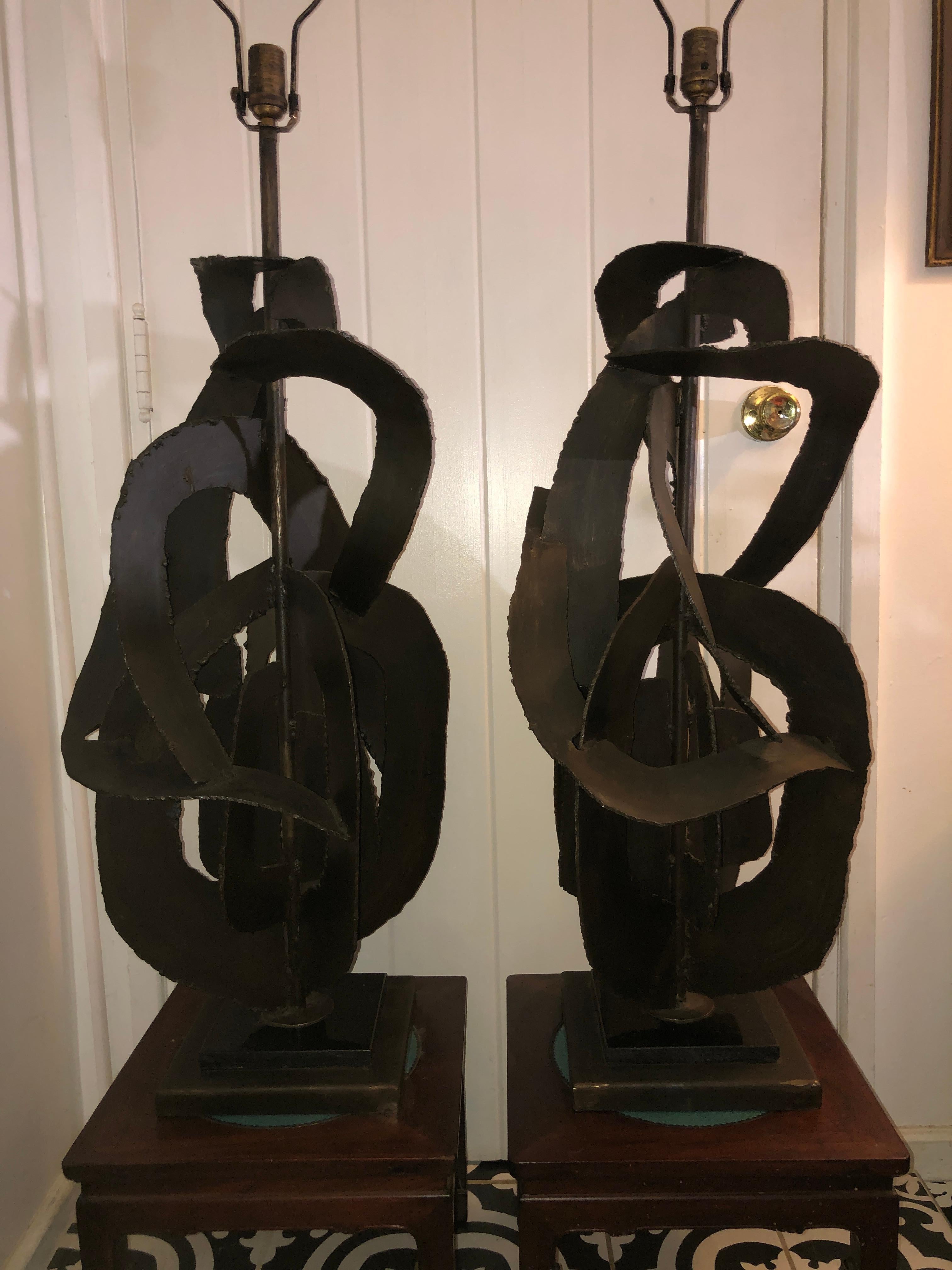 These Monumental pair of Brutalist lamps were designed by Richard Barr for the Laurel Lamp Company, Newark, N.J. This pair is much larger than most we have had in the past and were one of Barr’s “Studio Collection” series.  These lamps consists of