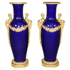 Monumental Pair Gold Dore' Figural Maiden Blue Porcelain Sevres Attributed Urns