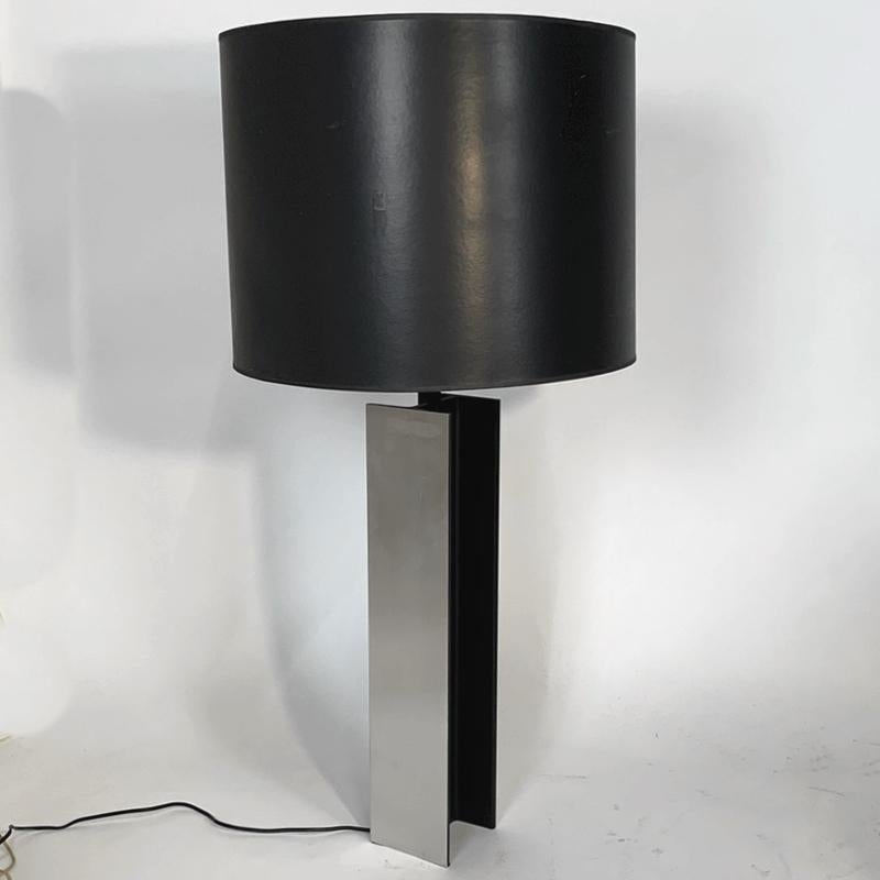 Pair of Laurel I Beam Lamps with original shades. Design is attributed to Jeff Jones. Polished aluminum i beam base with matte black finished detail. Lamps are 5 inch square and 38 inch high. The shades are 20 wide by 15 high. Shades are original-