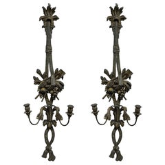 Paire monumentale d'appliques françaises anciennes en métal patiné