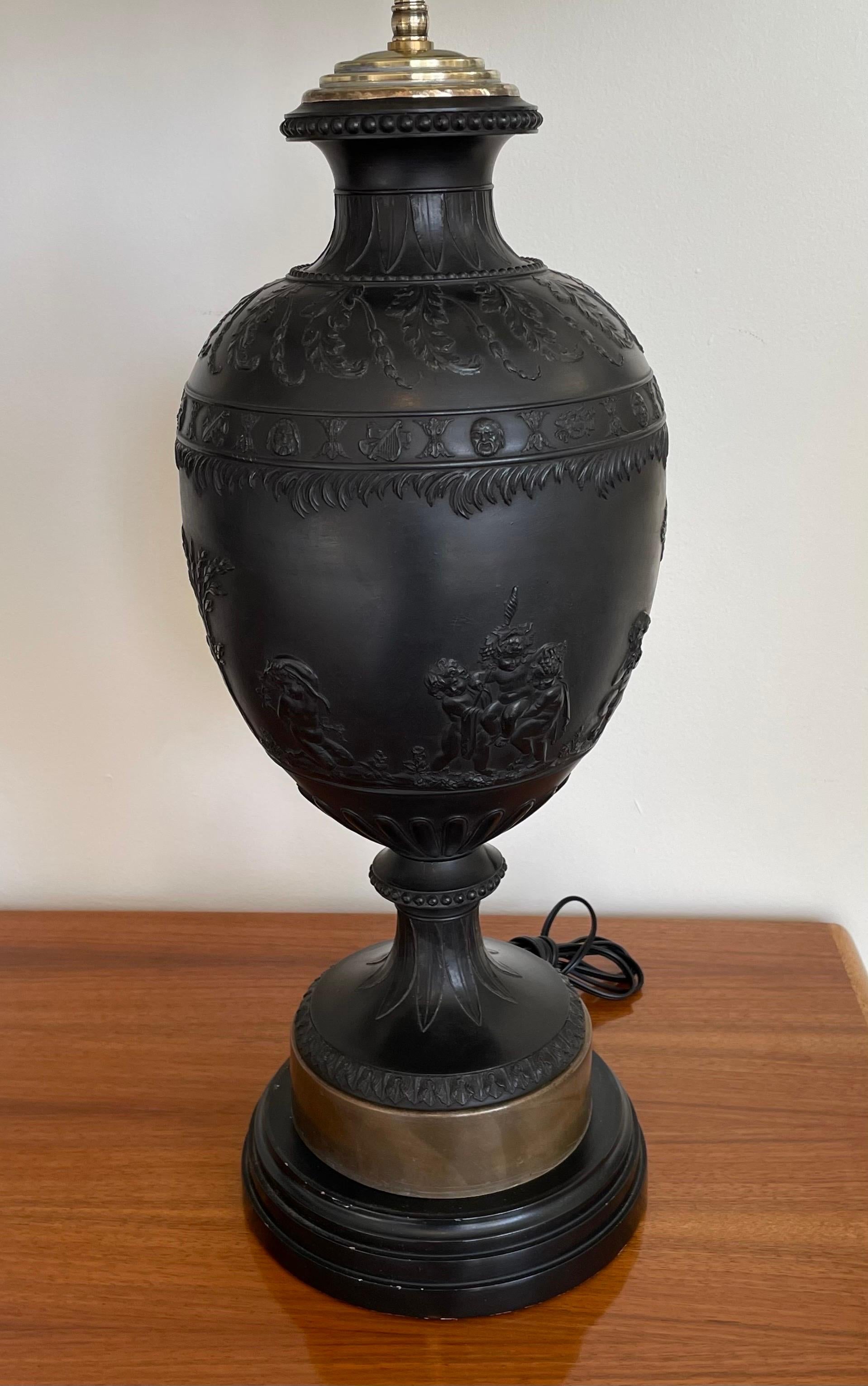 A remarkable pair of black basalt table lamps by Josiah Wedgwood, massive in size and very rare, hallmarked. Professionally cleaned and rewired with new solid brass sockets. Total height to top of shade is 35.50