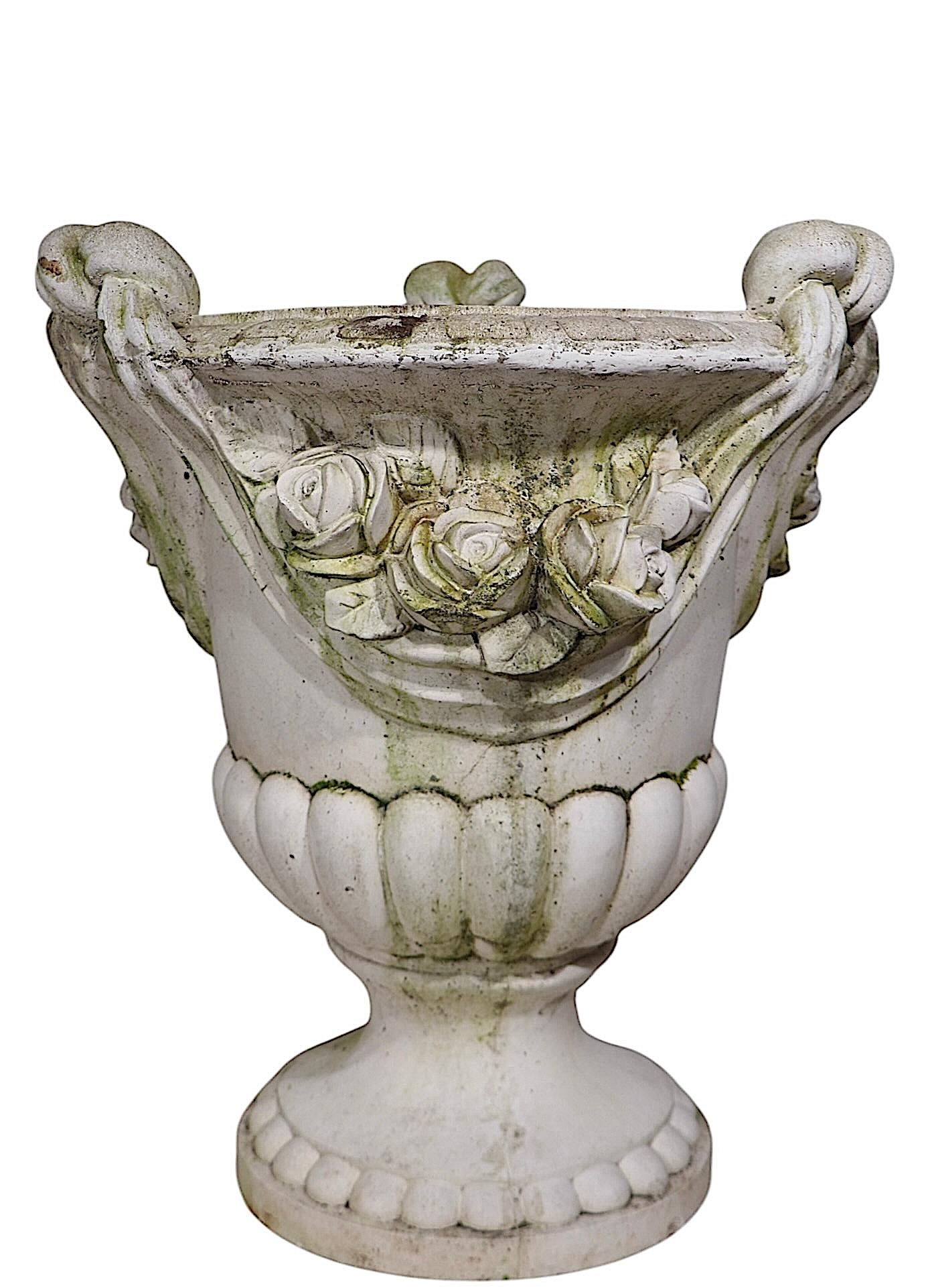 Monumental Pair of Cast Stone Urn Form Planters with Flower and Swag Decoration In Good Condition For Sale In New York, NY