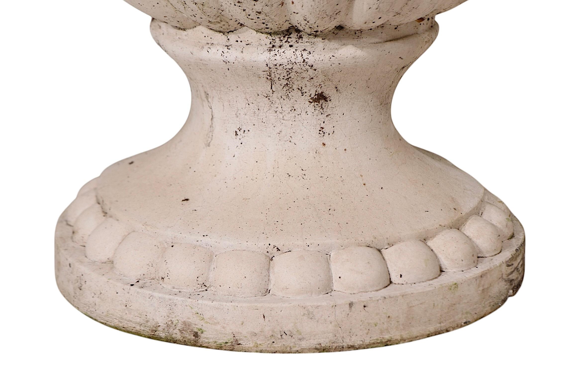 Monumental Pair of Cast Stone Urn Form Planters with Flower and Swag Decoration For Sale 2