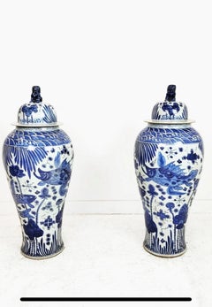 Monumental Pair of Chinese Blue and White Porcelain Covered Temple Jars