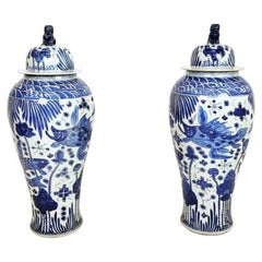 Monumental Pair of Chinese Blue and White Porcelain Covered Temple Jars